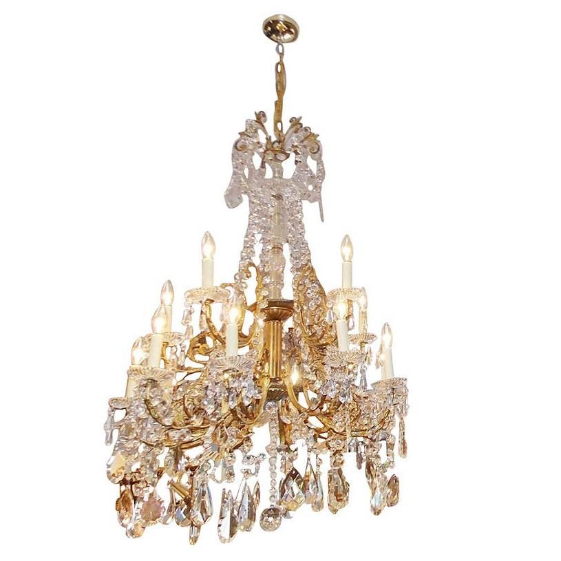  French Gilt Bronze and Crystal Fifteen Light Chandelier. Circa 1815