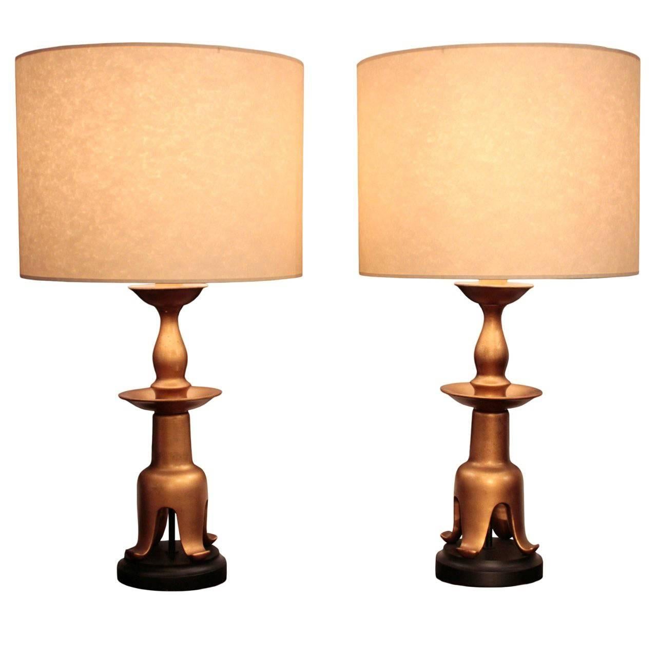 Pair of American large gilt lacquered table lamps, possibly by James Mont For Sale