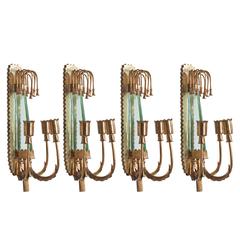 Set of Four Brass and Thick Green Glass Sconces, in the Style of Pietro Chiesa
