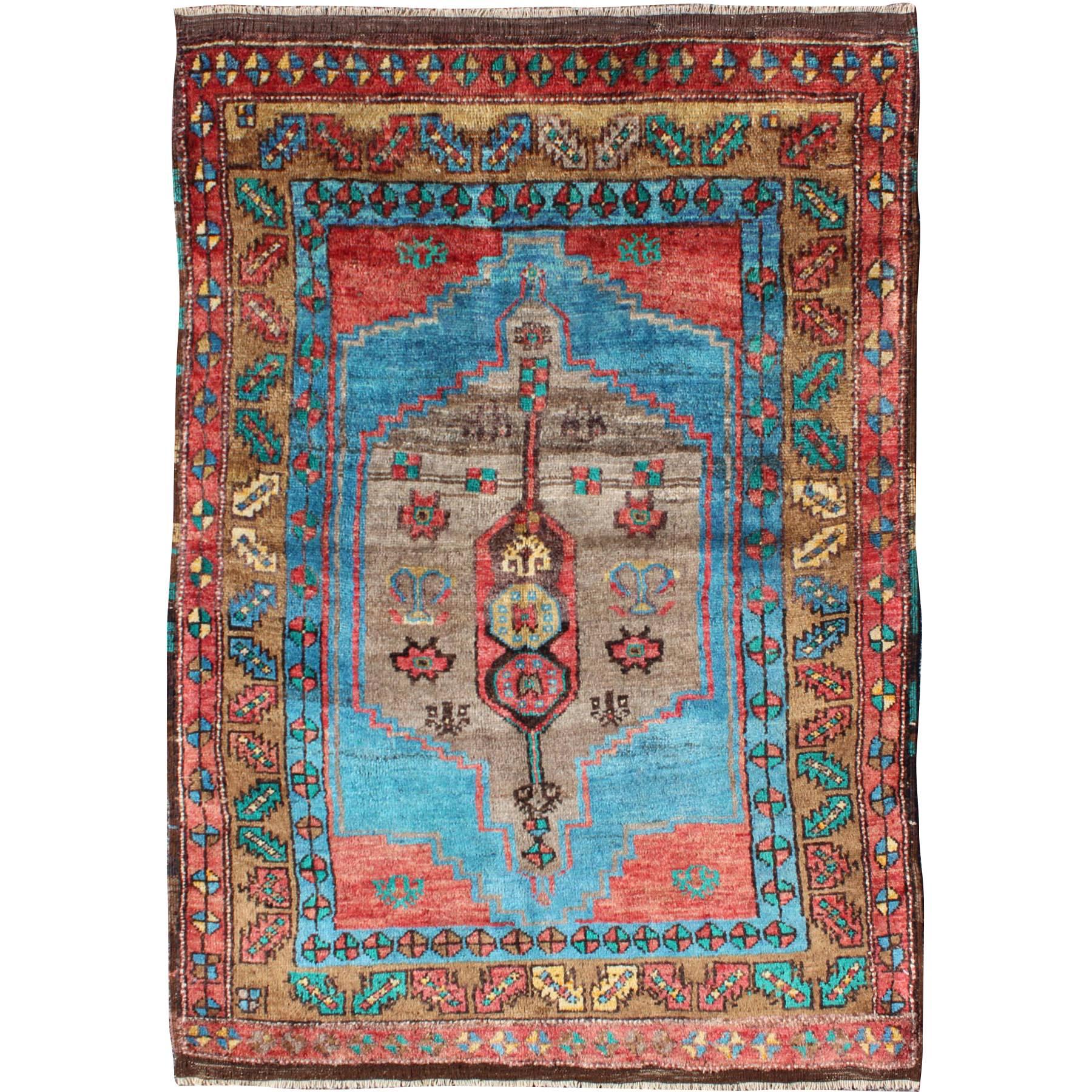 1930's Antique Oushak Rug in Bright Colors of Blue, Terracotta, Green & Yellow For Sale