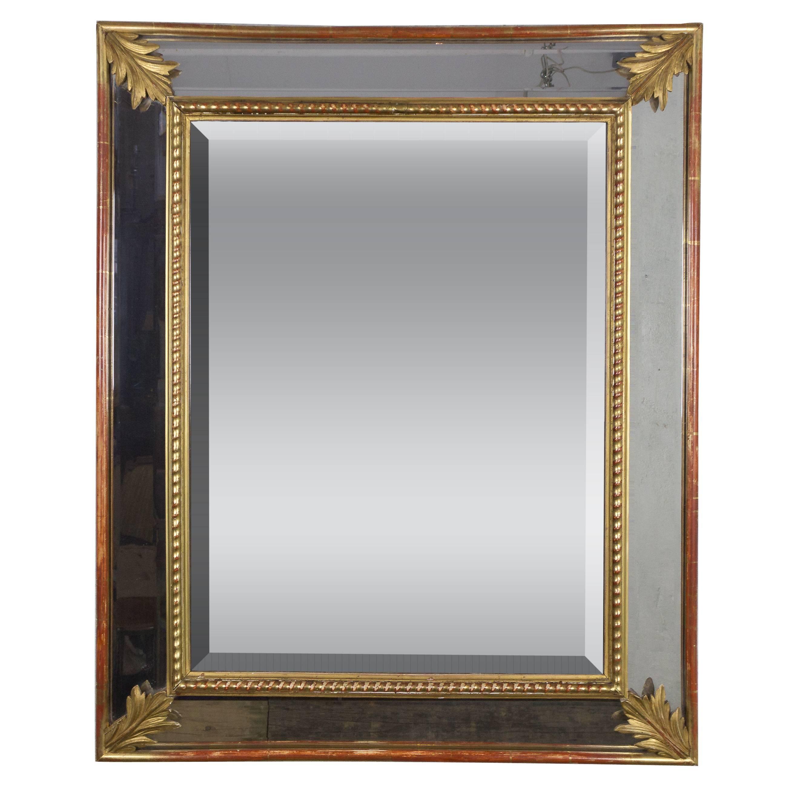 Miroir biseauté en bois doré du XIXe siècle français