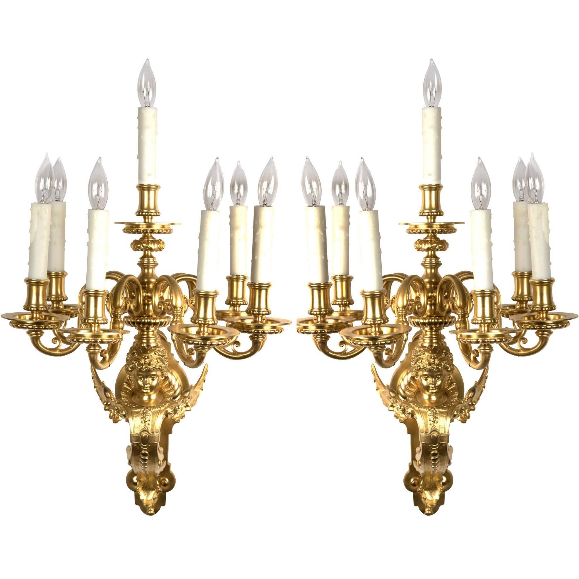 A pair of French Beaux Arts Ormolu Sconces