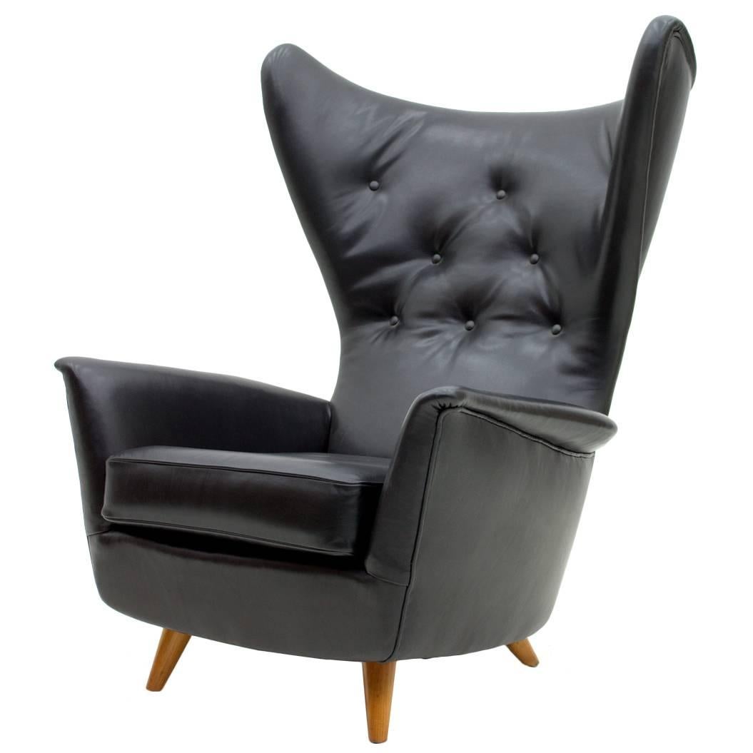 European Four Black Leather Wing Lounge Chairs, 1950s For Sale