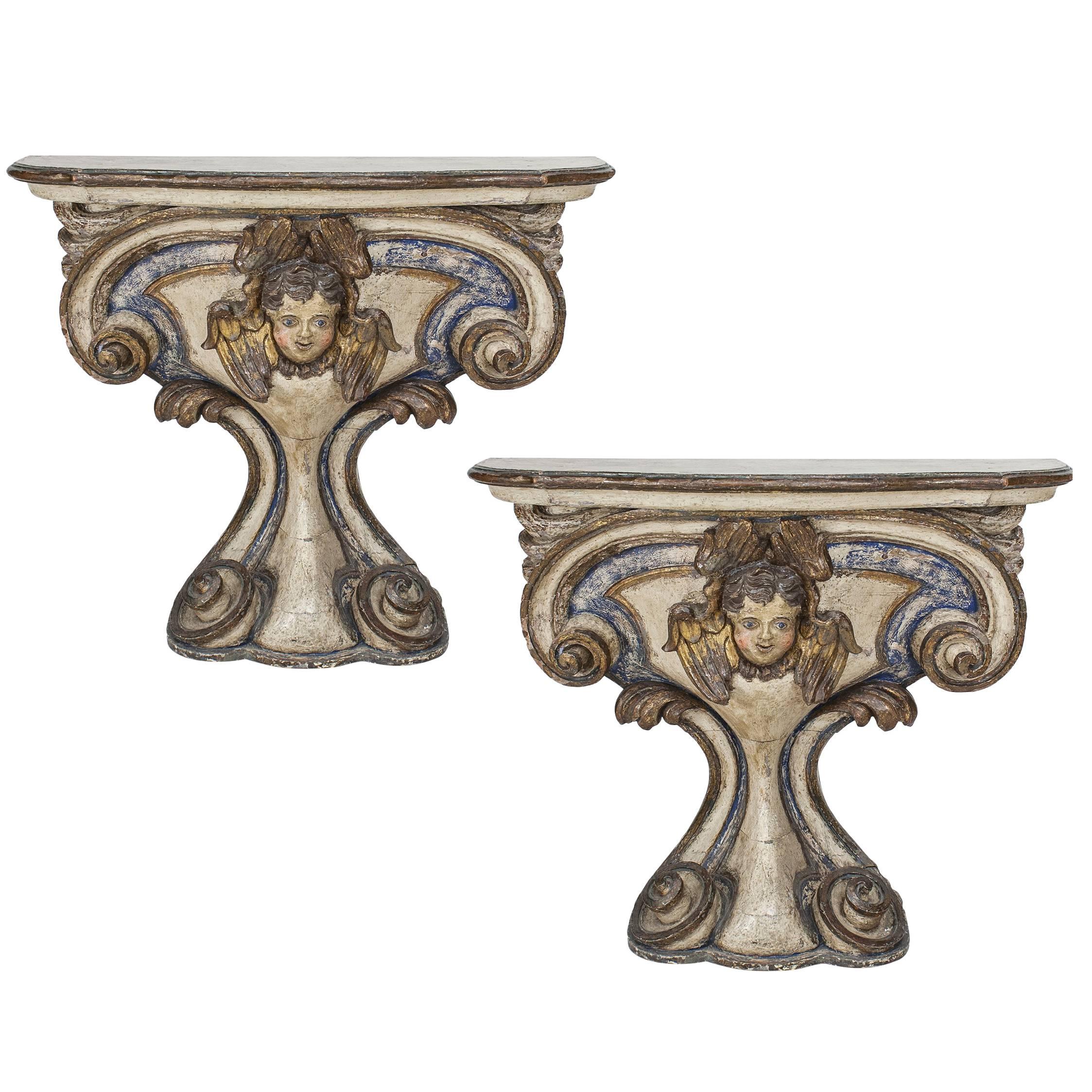 Pair of 18th Century Italian Polychrome and Gilt Limewood Consoles with Cherubs