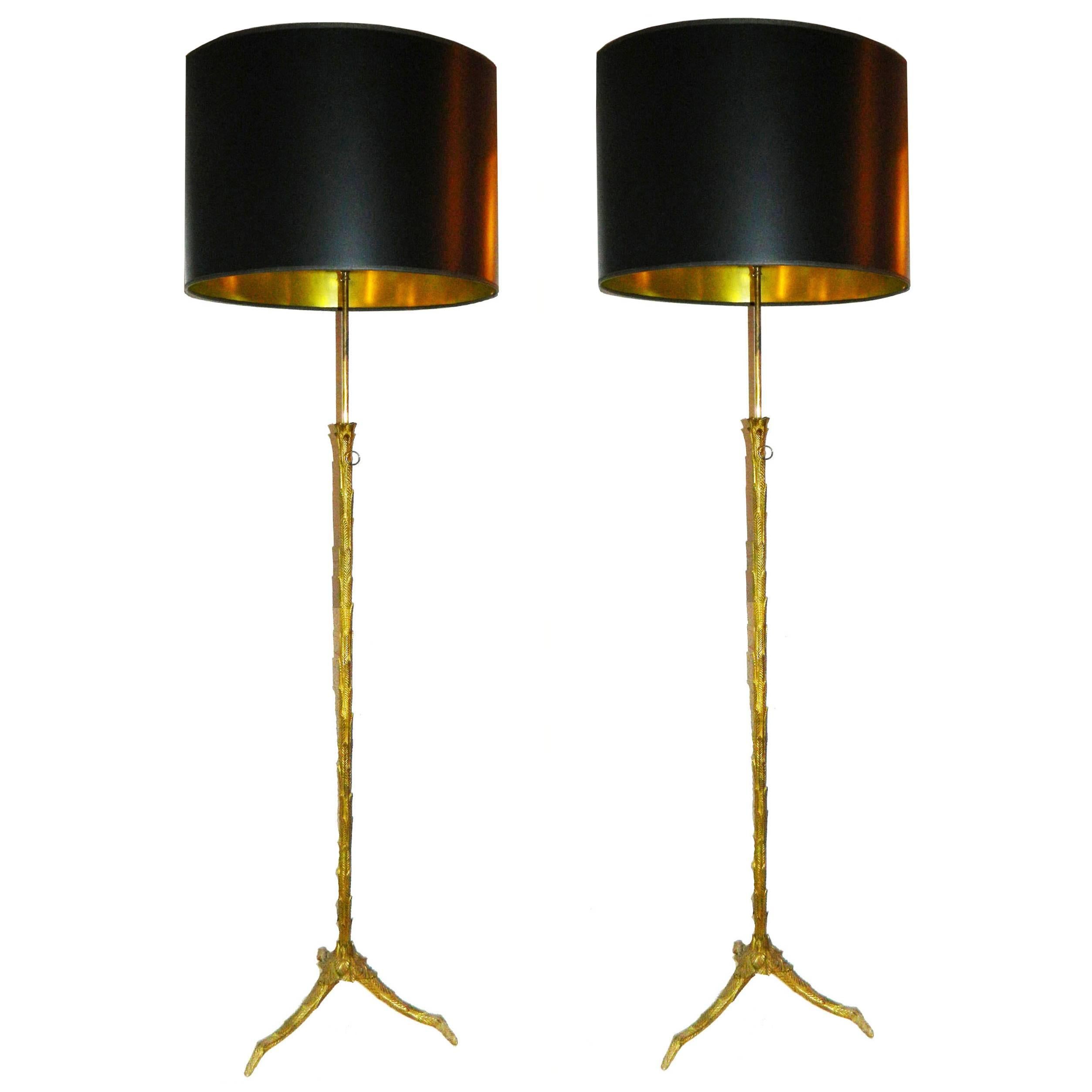 Pair of Maison Charles Bronze Floor Lamps