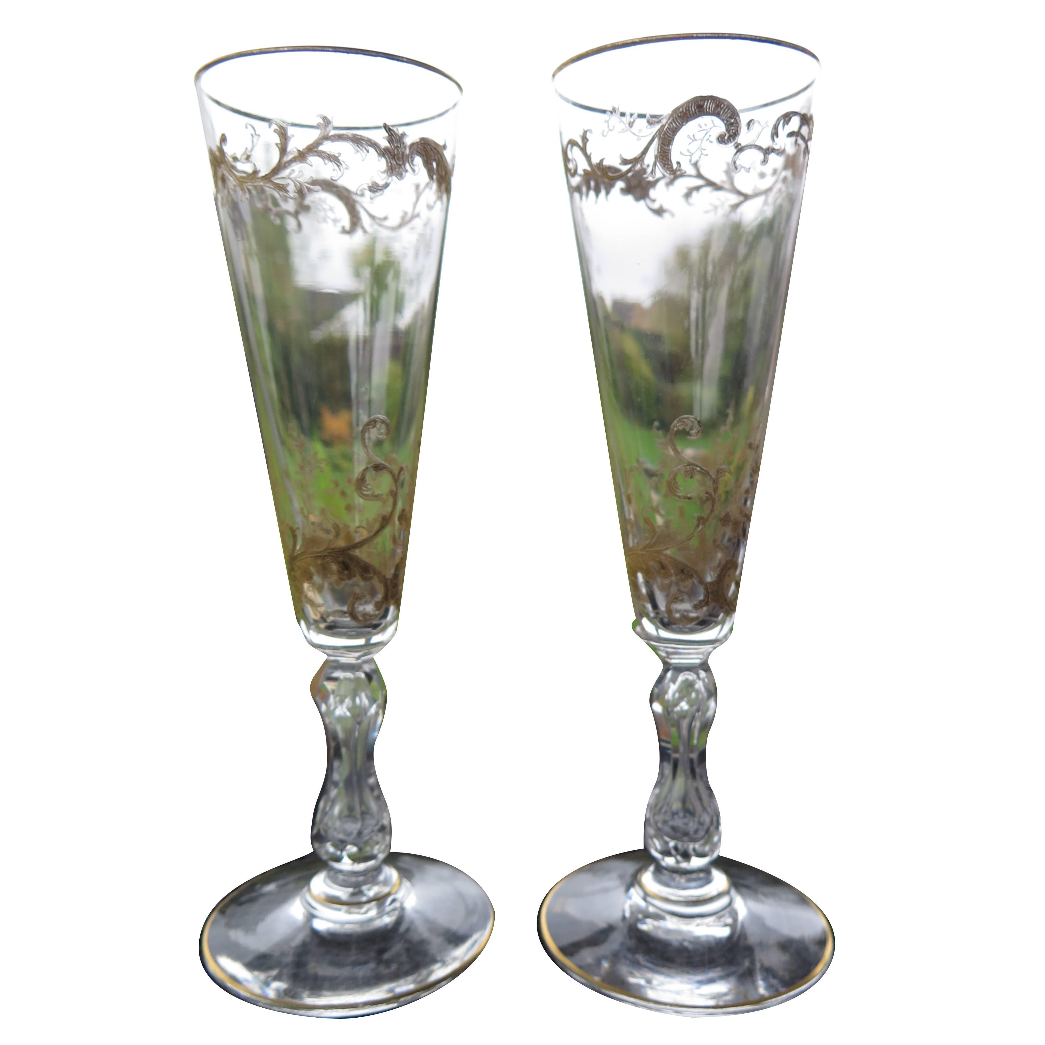 This is a very fine pair of crystal champagne flutes from the late 19th century.

Gilded drinking glasses of this quality and detail are rare and these pair would probably have been made as cabinet glasses.

They are made from handblown lead