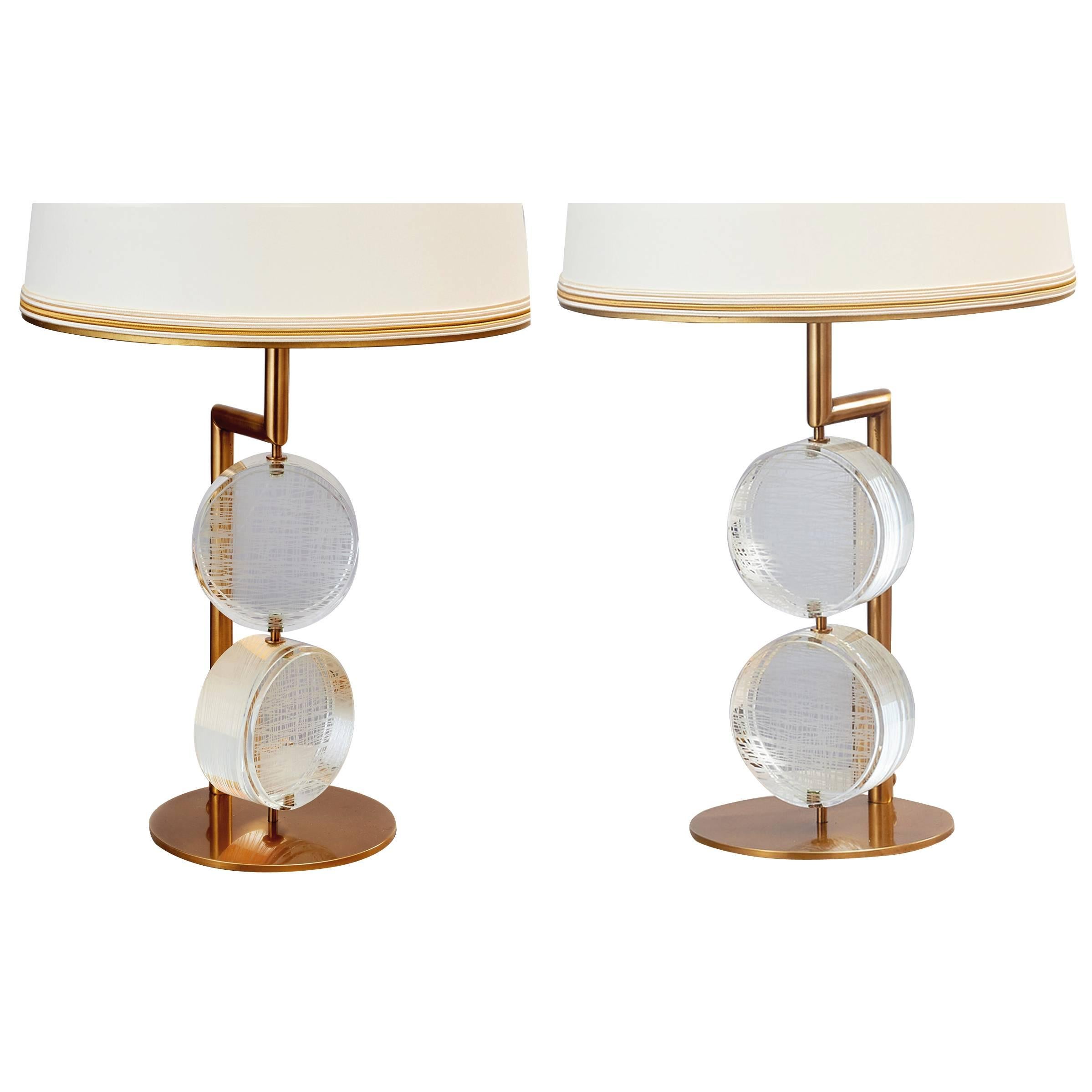 Roberto Rida (b.1943).
A kinetic pair of elongated table lamps with thick, movable, etched glass disks, bronze mounts.
Signed,  Italy, 2017.
Priced by the pair, two pair available
Dimensions: 30 H x 12 diameter.
Limited edition exclusive to L'Art de