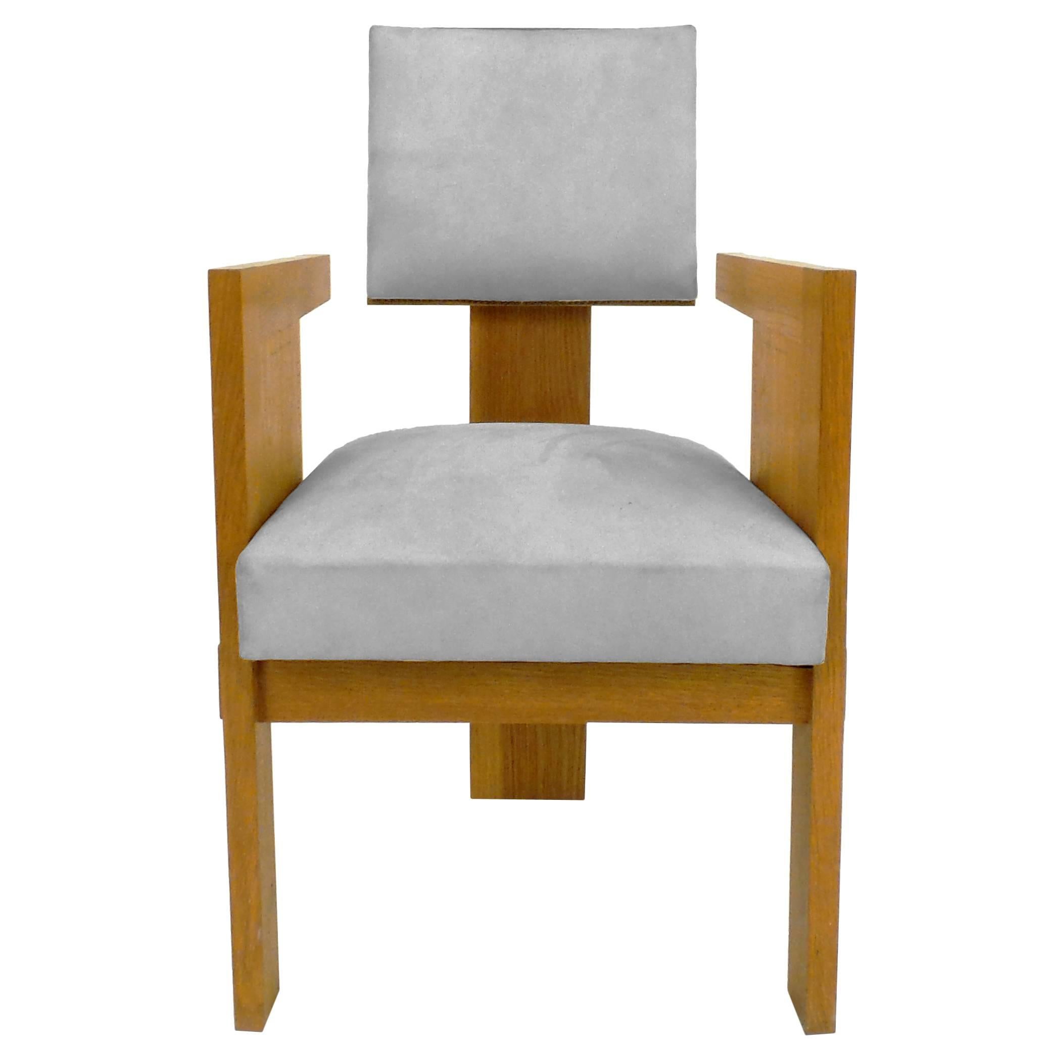 A most unusual Art Deco chair model designed by Andre Sornay, circa 1932 in Lyons, France. Executed in white oak with brass details and Sornay's signature brass studs (cloutage). Custom versions available. Also available as side chair (please