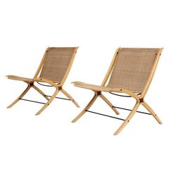 Pair of lounge “X” chair by Peter Hvidt & Orla Mølgaard Nielsen for Fritz Hansen