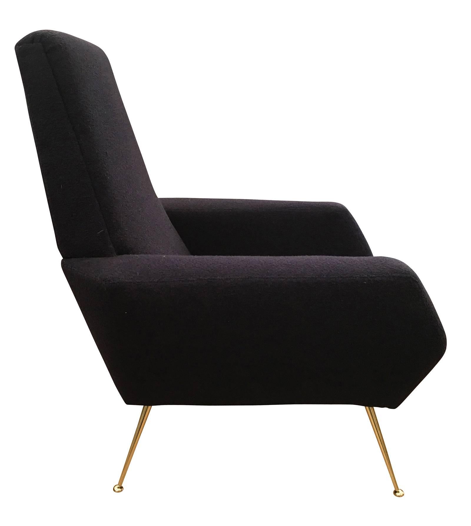 Lounge chairs characterized by straight and diagonal lines. High seat and beautiful brass detailed legs.Very comfortable.This is a great example of Mid-century Italian design.One has been upholstered with the fabric shown for display purposes and