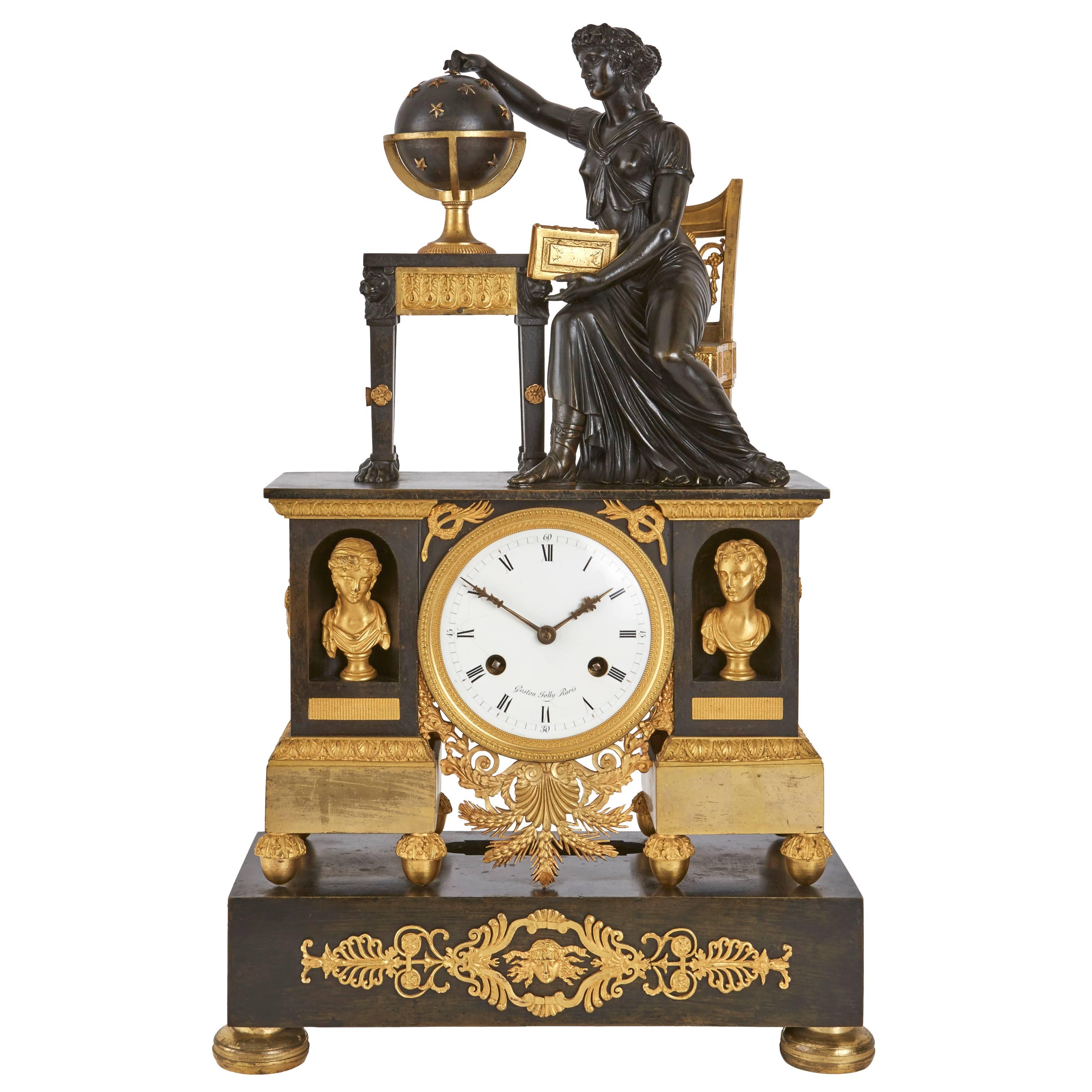 Pendule de cheminée d'époque Empire en bronze doré et patiné de Gaston Jolly en vente