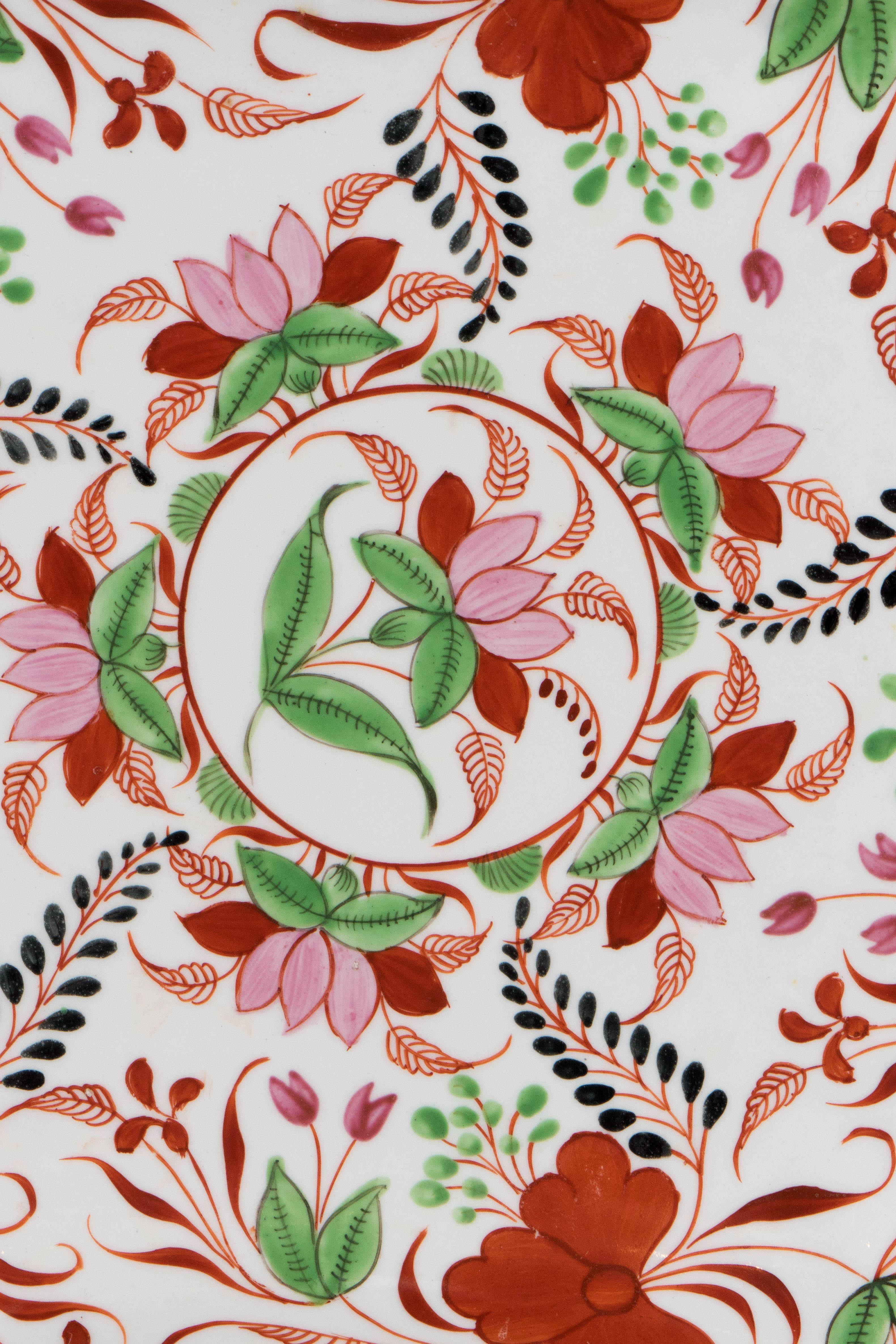 An extraordinary group of Miles Mason dishes in an striking pattern
of pink and orange flowers and green leaves.
The Miles Mason Factory made some of the finest porcelain in England during the Regency period. This group now consists of:
Two pairs