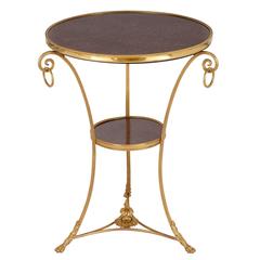 Table Gueridon circulaire en bronze doré et porphyre d'époque française