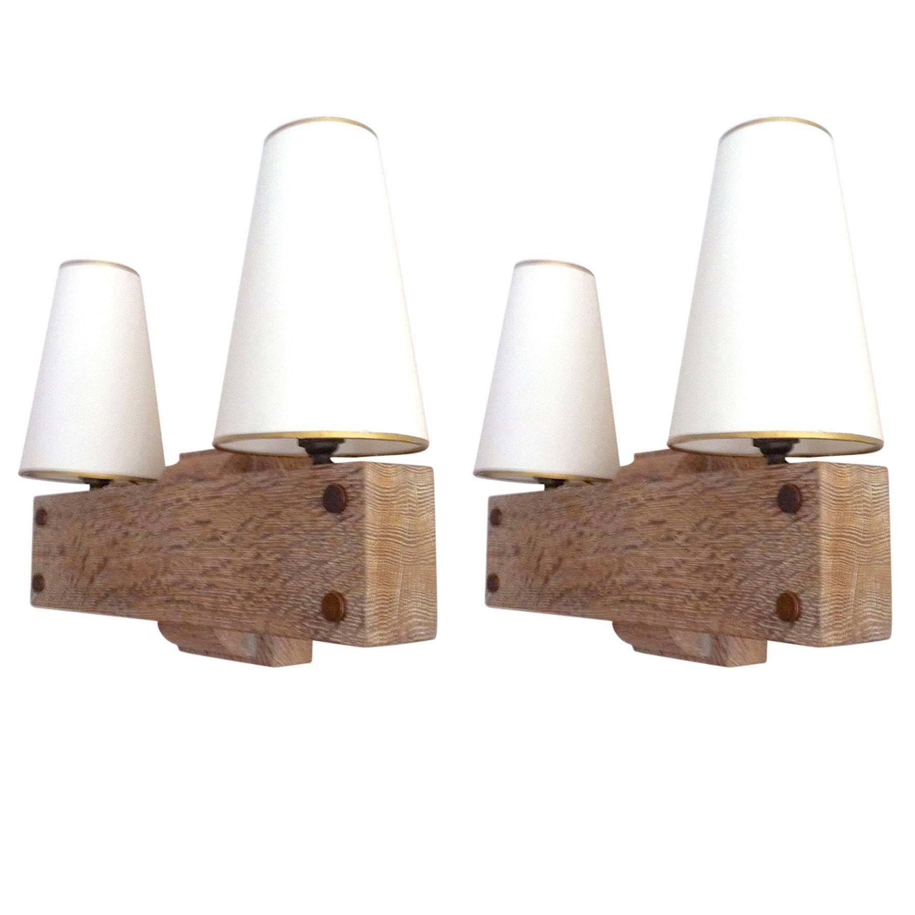 Charles Dudouyt Stamped Rarest Pair of Cerused Solid Oak Sconces For Sale