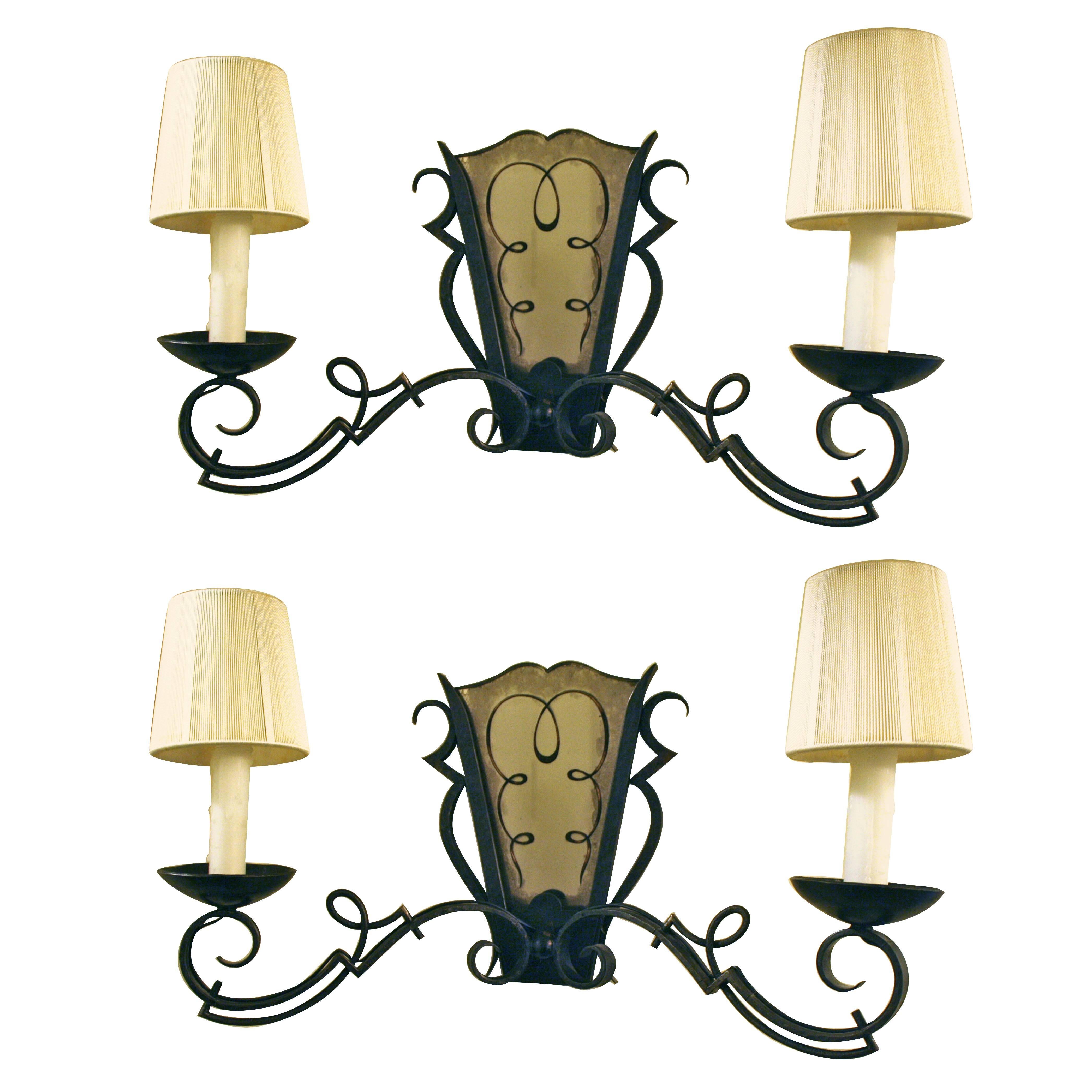 Pair of 1940s French Wrought Iron Wall Lights Attributed to Gilbert Poillerat