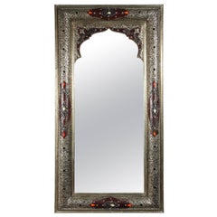 Specchio marocchino con design in argento e pelle