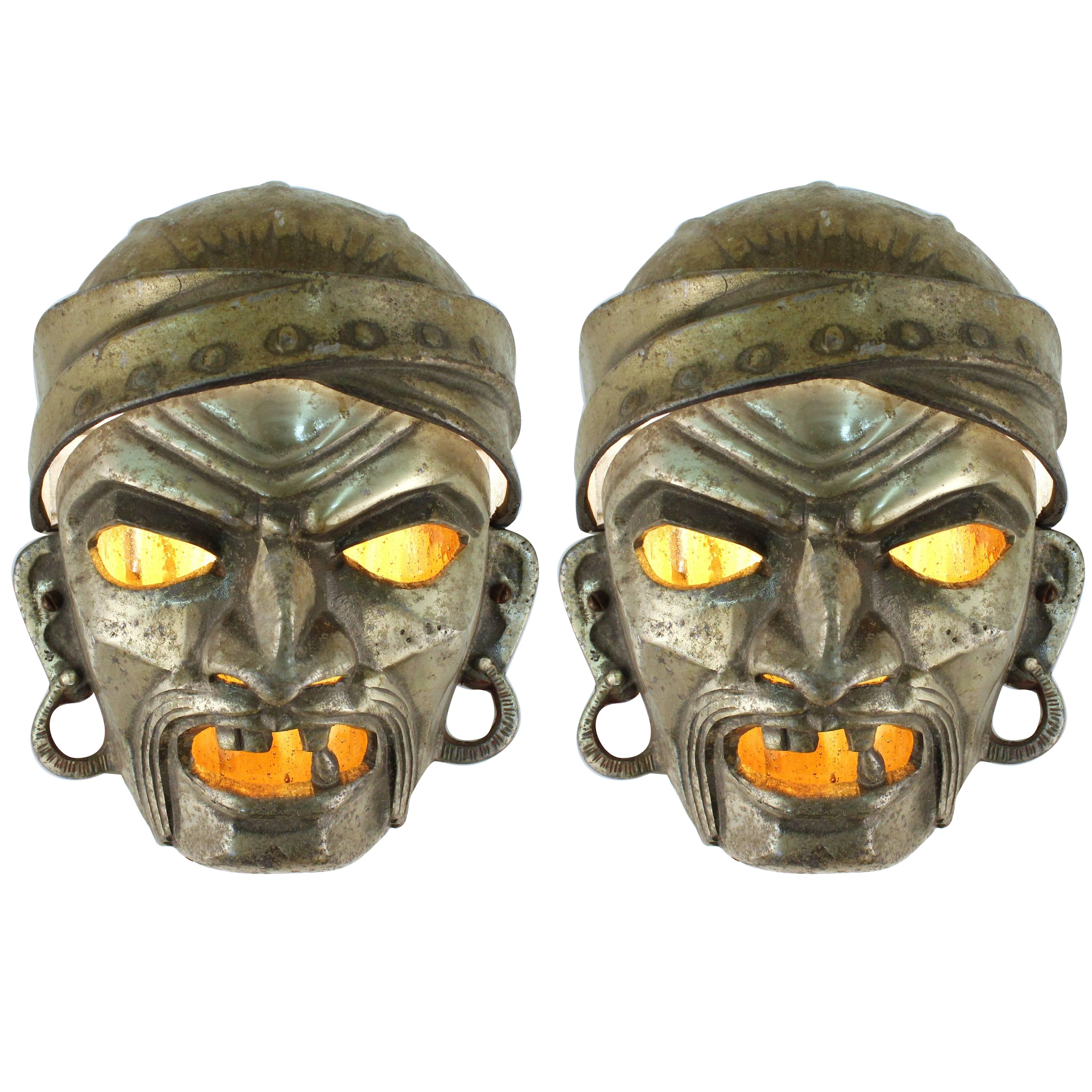 Pair of 1930s Wall Sconces as Grotesque Masks in Cast Metal