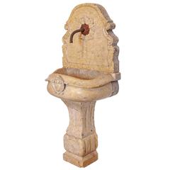Vintage Carved Marble Wall Fountain with Iron Spout from Italy