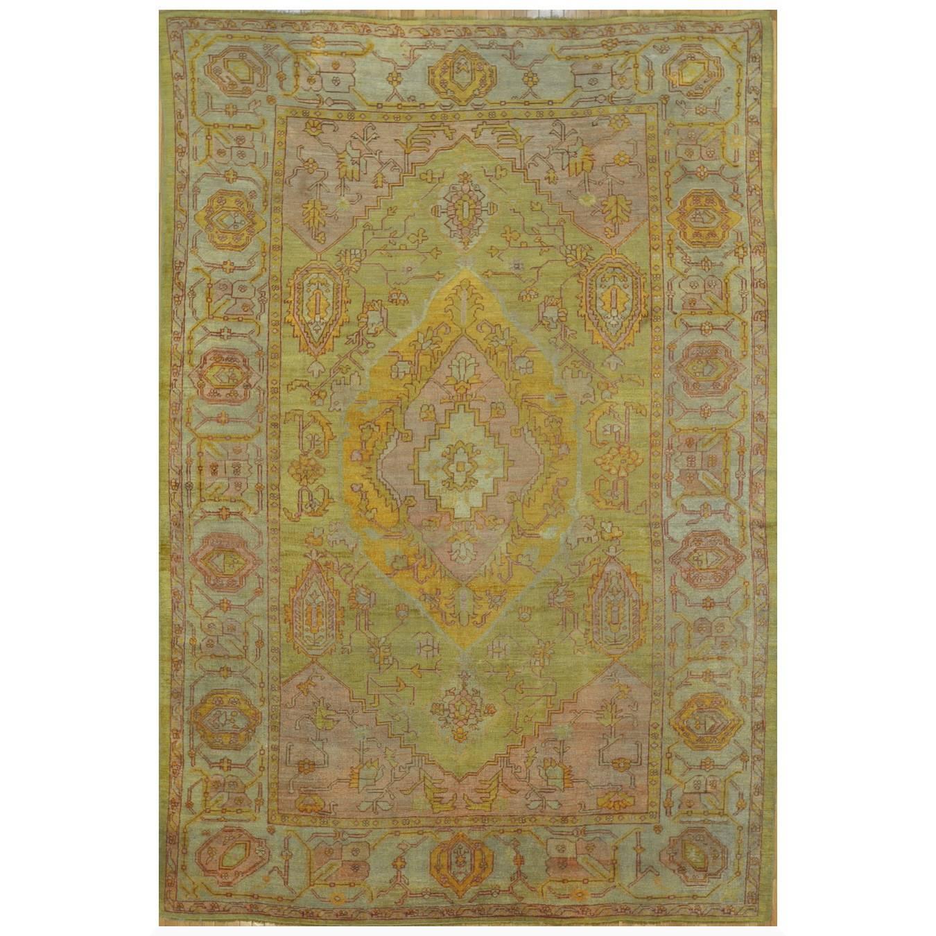 Antique Hand-Knotted Green Color Wool Turkish Oushak Rug For Sale