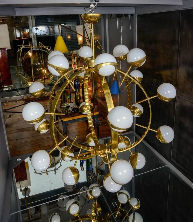 Pair of Round Brass Chandeliers For Sale at 1stdibs