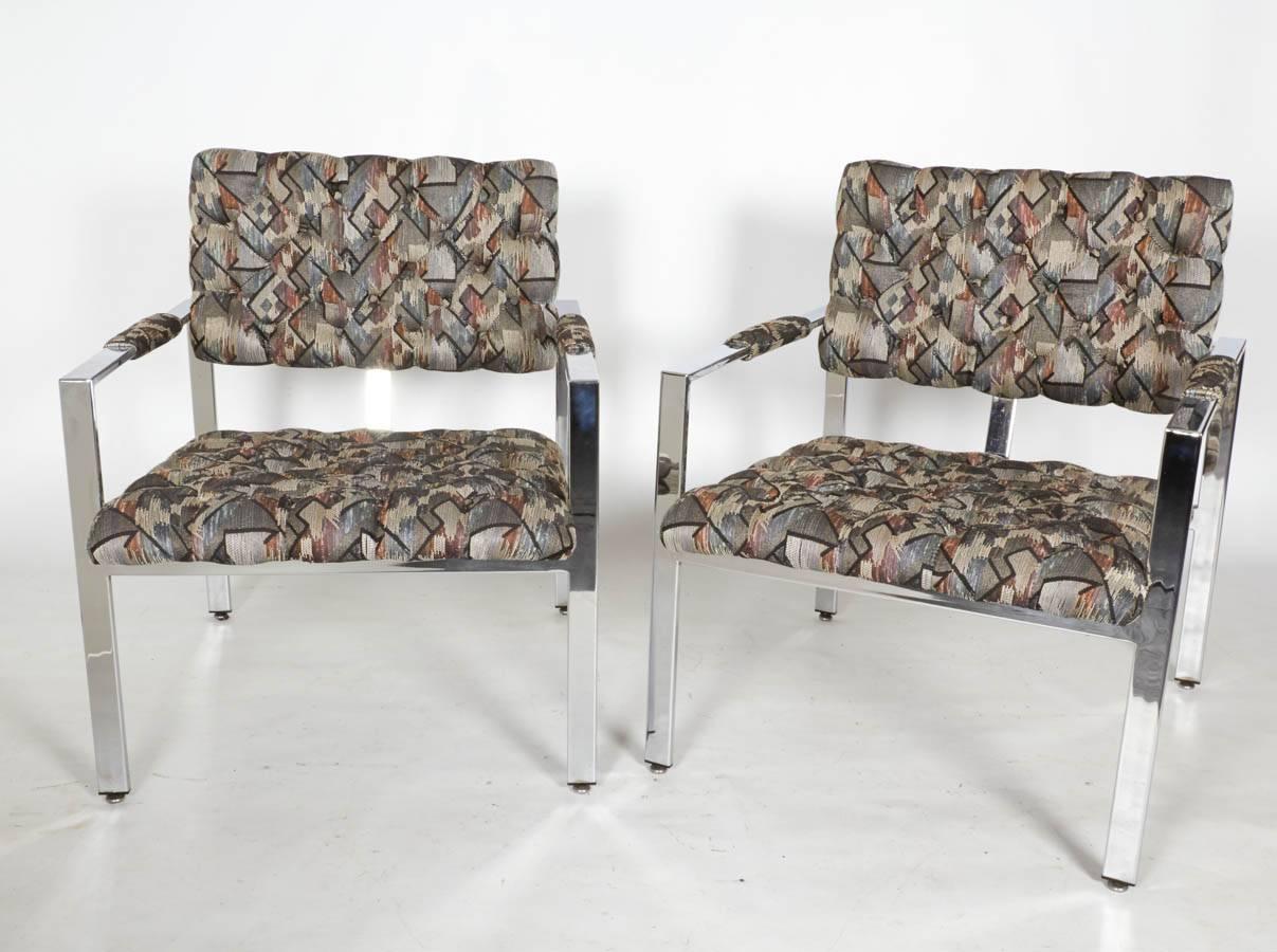 Wonderful pair of lounge chairs with tufted seats and backs mounted on nicely geometric polished chrome frames. Striking! Please contact for location. 