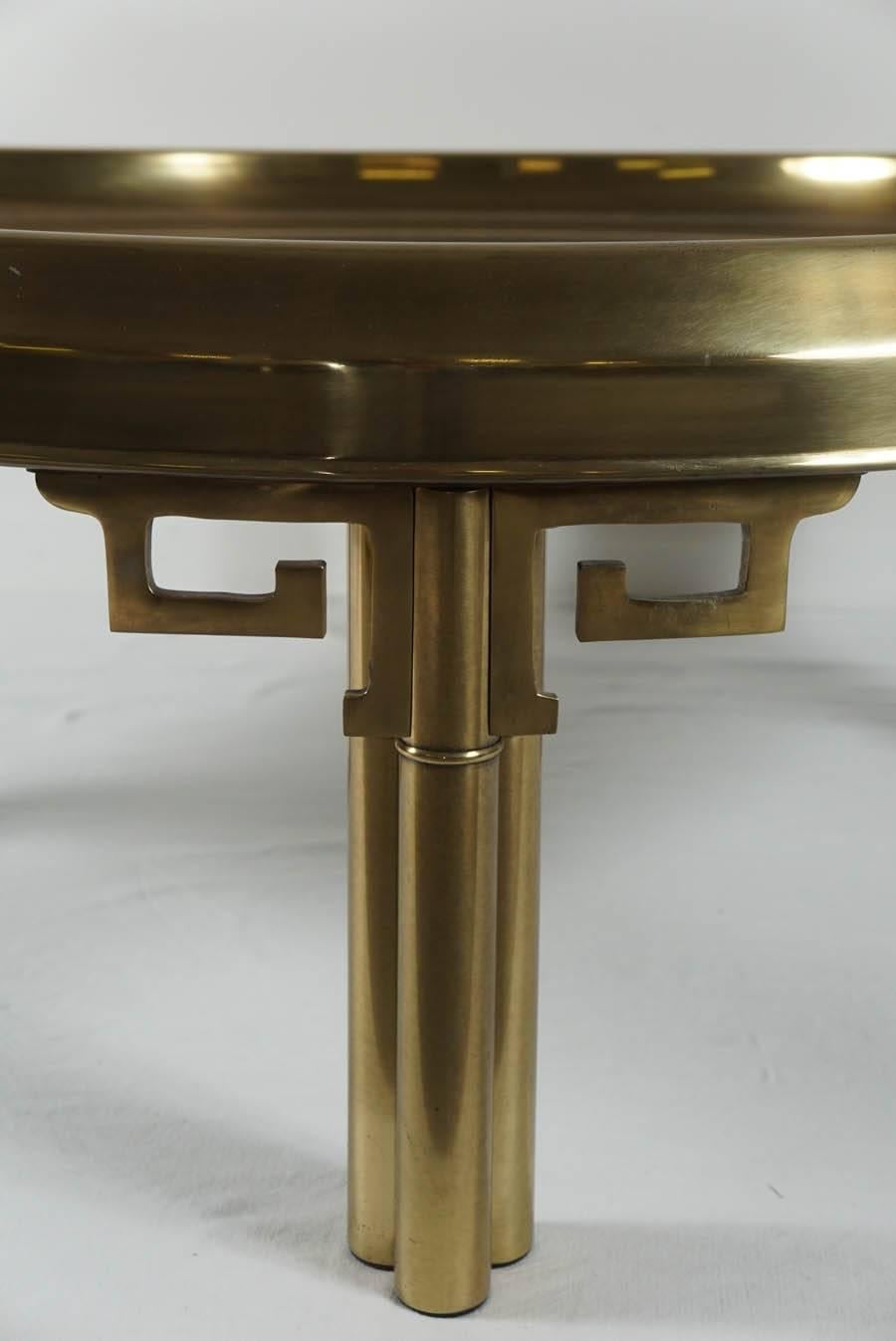 American 1970's mastercraft round brass coffee table with greek key detail For Sale