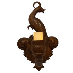 German Art Deco carved walnut bird of paradise sconce