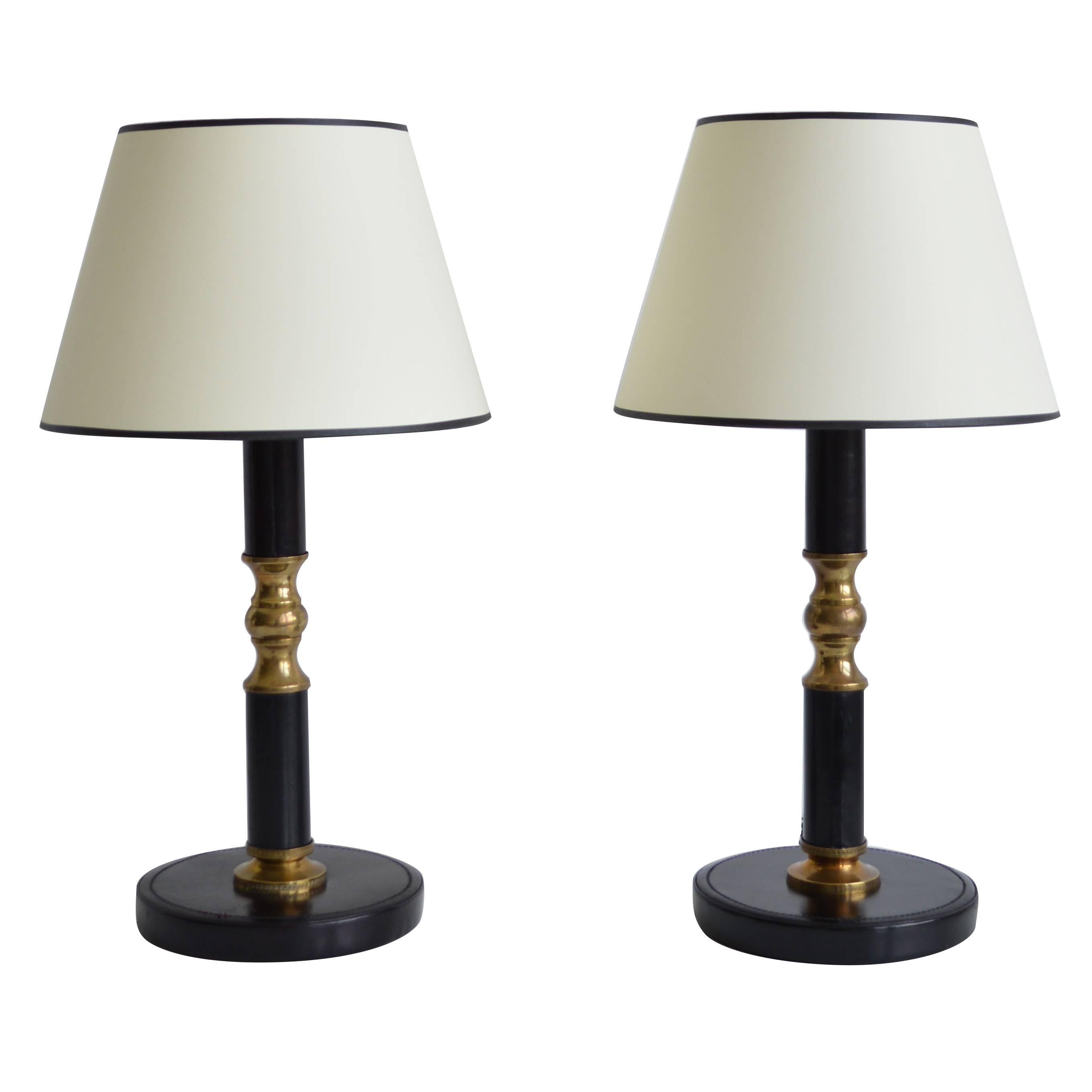 Pair of Black Leather and Brass Lamps by Jacques Adnet