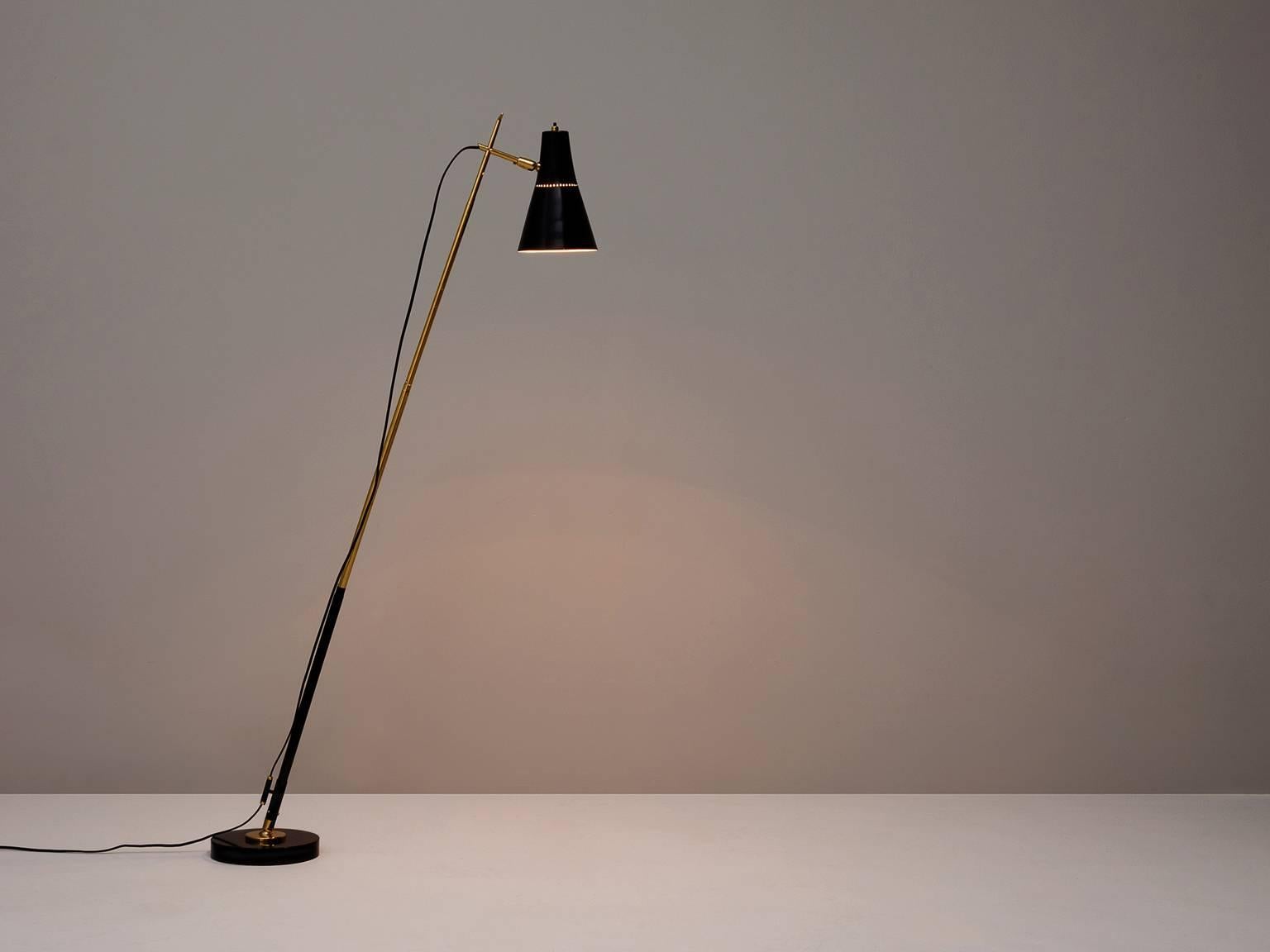 Giuseppe Ostuni for O-Luce, adjustable floor lamp, in metal, stone and brass, Italy, 1951. 

Exceptional light, which can be used as floor and table lamp is part of the midcentury design collection by Morentz. The black coated and brass stern is