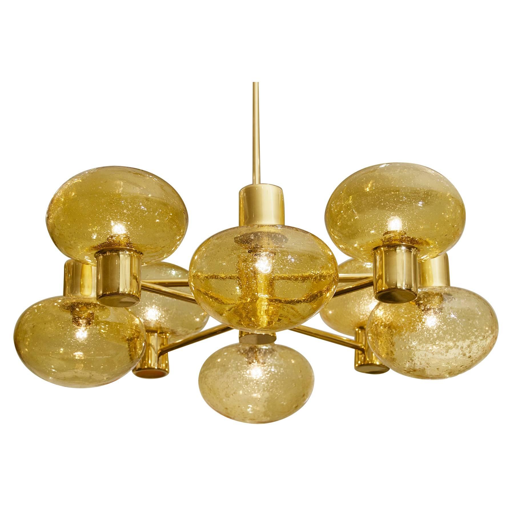 Eight-Arm Doria Brass Chandelier with Amber Glass Globes