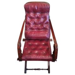 Red Leather Campaign Chair