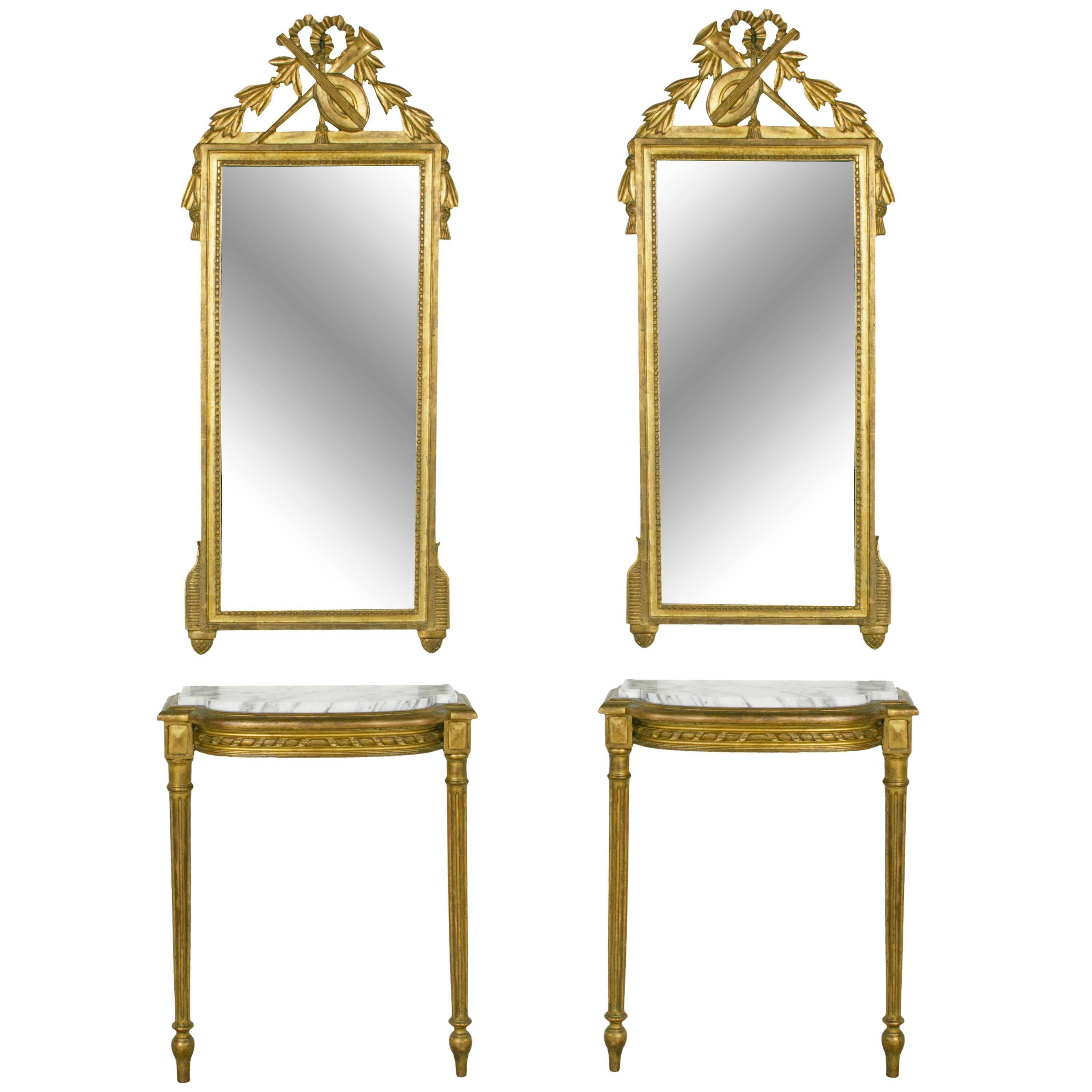 Tall Pair of Louis XVI Giltwood Mirrors and Consoles with White Marble