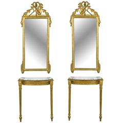 Tall Pair of Louis XVI Giltwood Mirrors and Consoles with White Marble