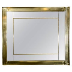 Mirror surrounded with Murano glass.