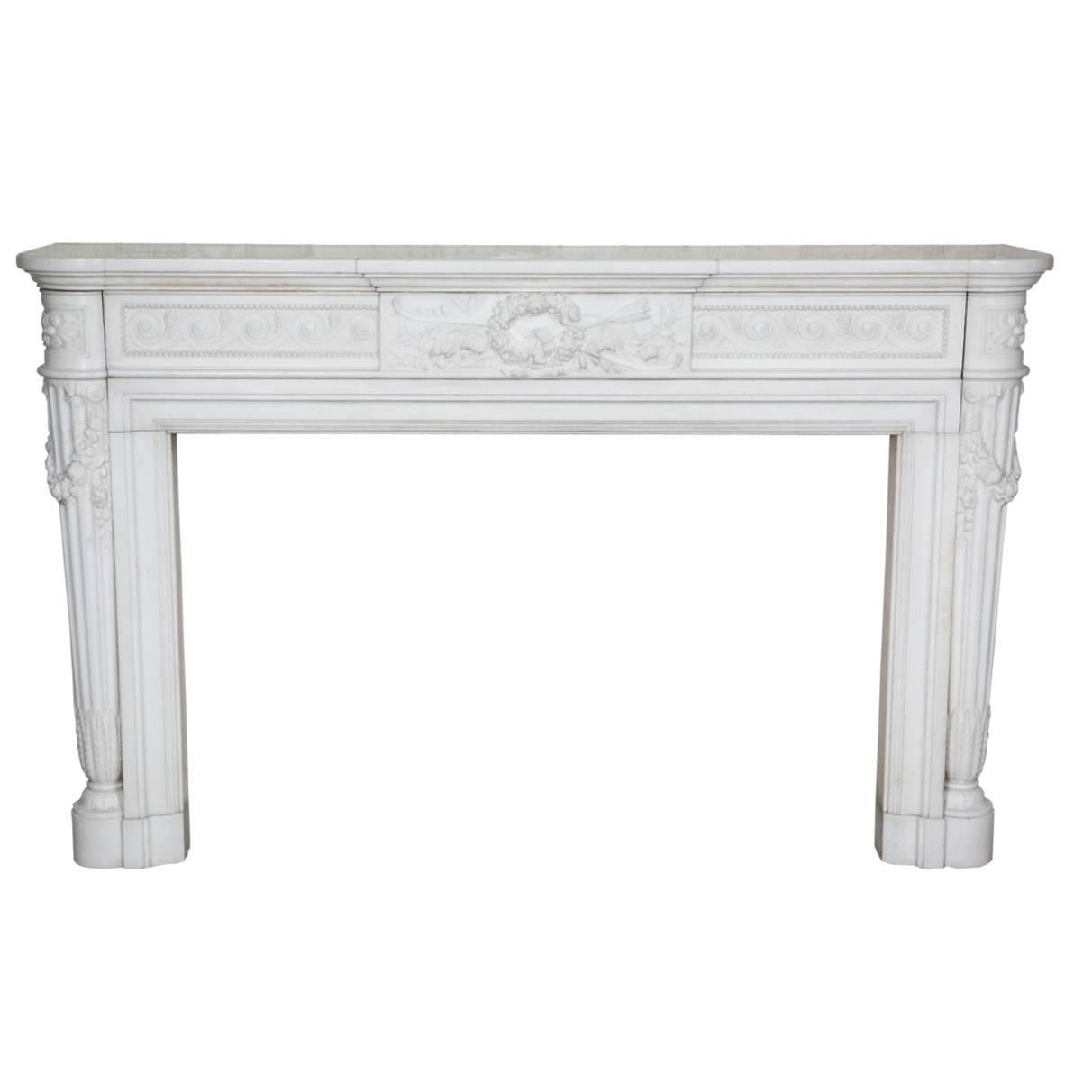 Pair of Antique Louis XVI Statuary Marble Fireplace Surrounds For Sale