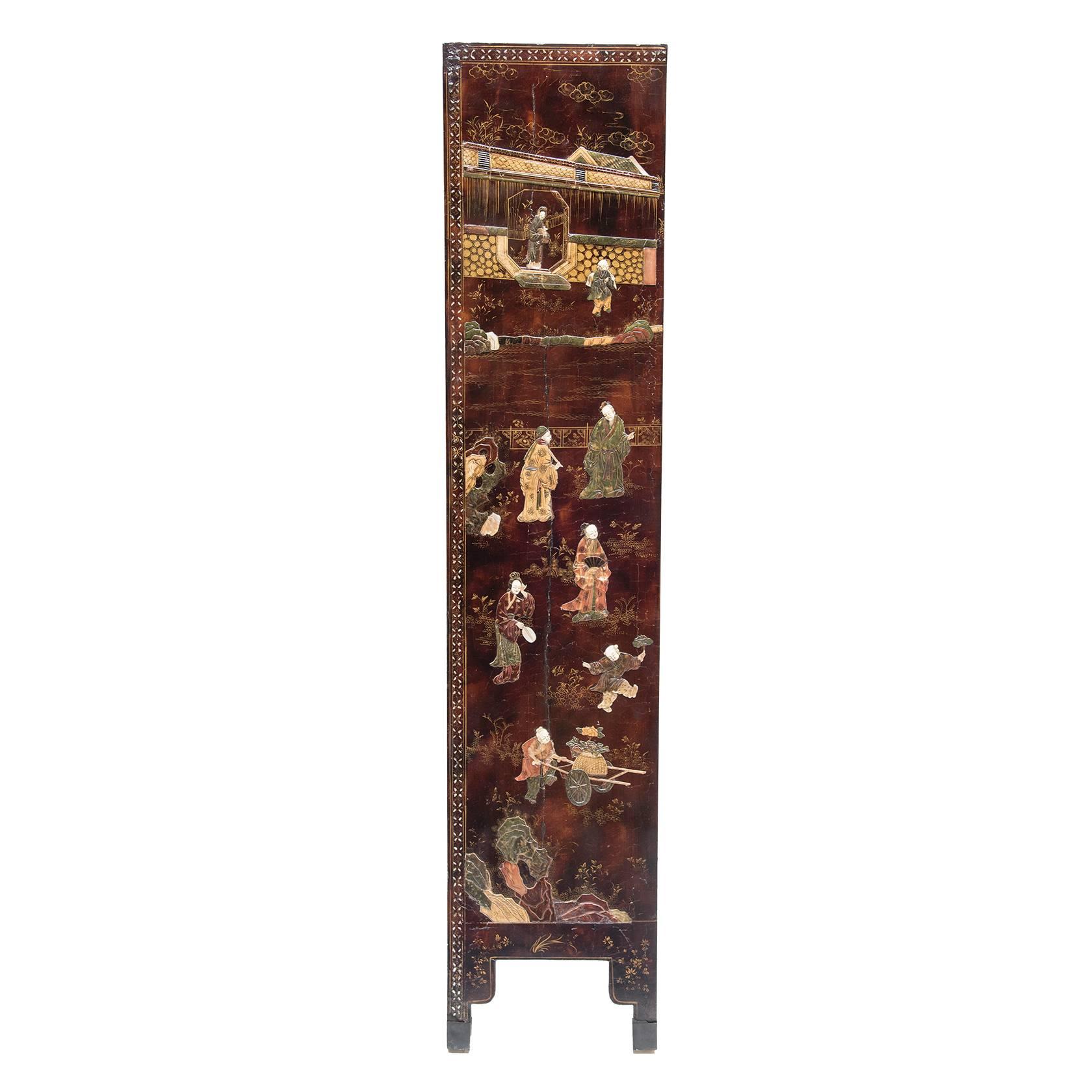 An 18th century six-panel screen exquisitely inlaid with soapstone, mother-of-pearl, jade, and bone with a continuous scene depicting robed scholars and attendants in a garden setting. A hard stone pavilion next to a waterway is central to the