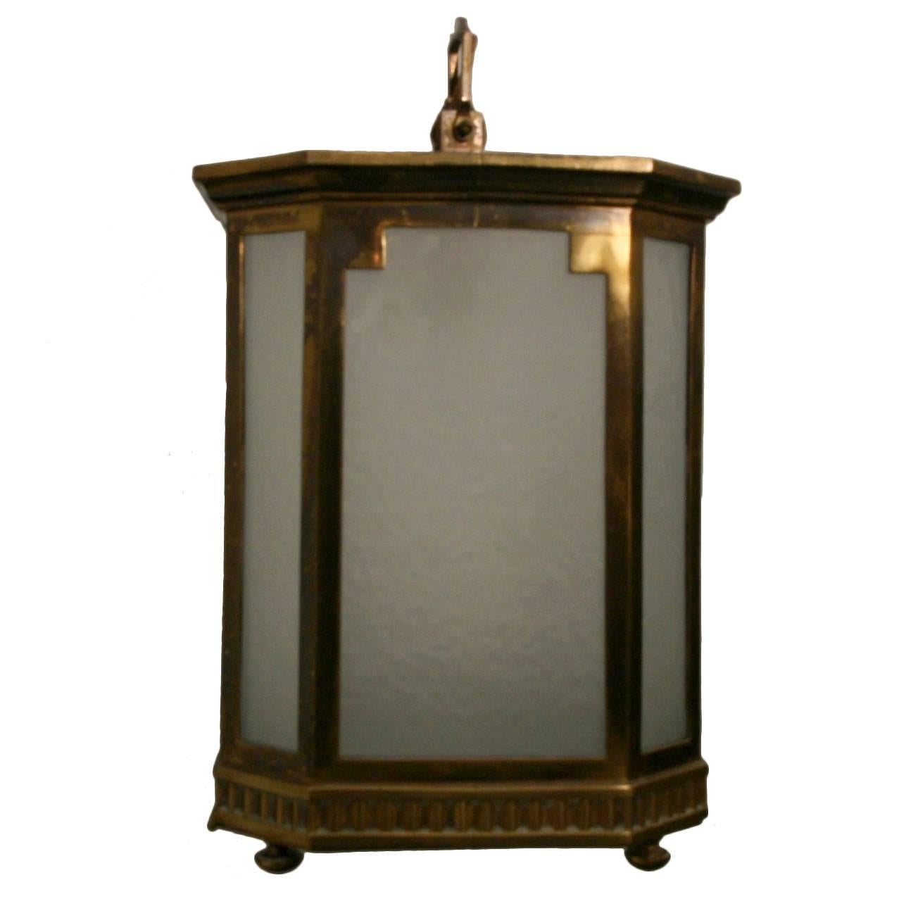 A pair of Art Deco Frosted Glass and Bronze Lanterns