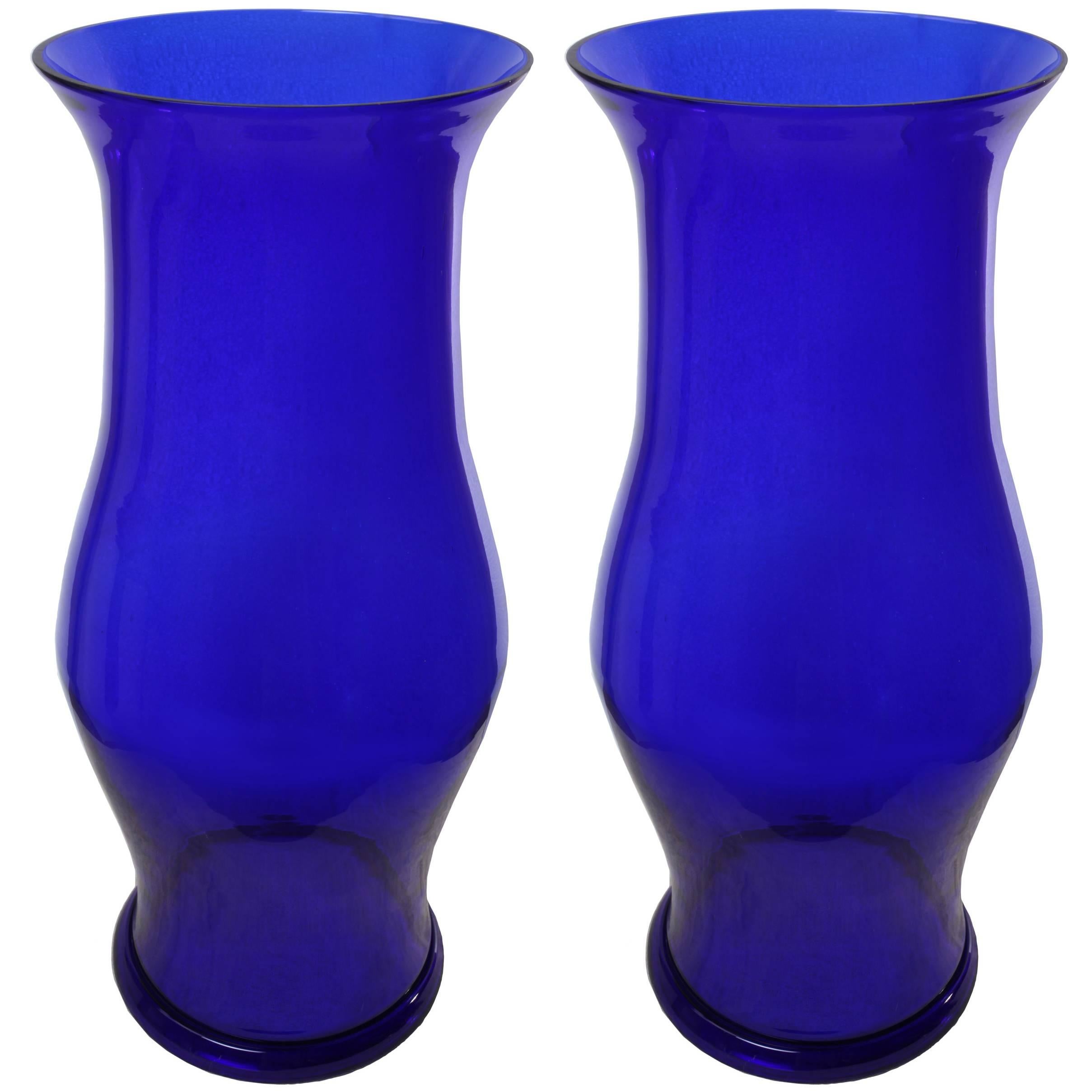 Pair of rare cobalt blue, handblown hurricane shields. Fabulous size and shape, rolled rim at the bottom and in excellent condition.