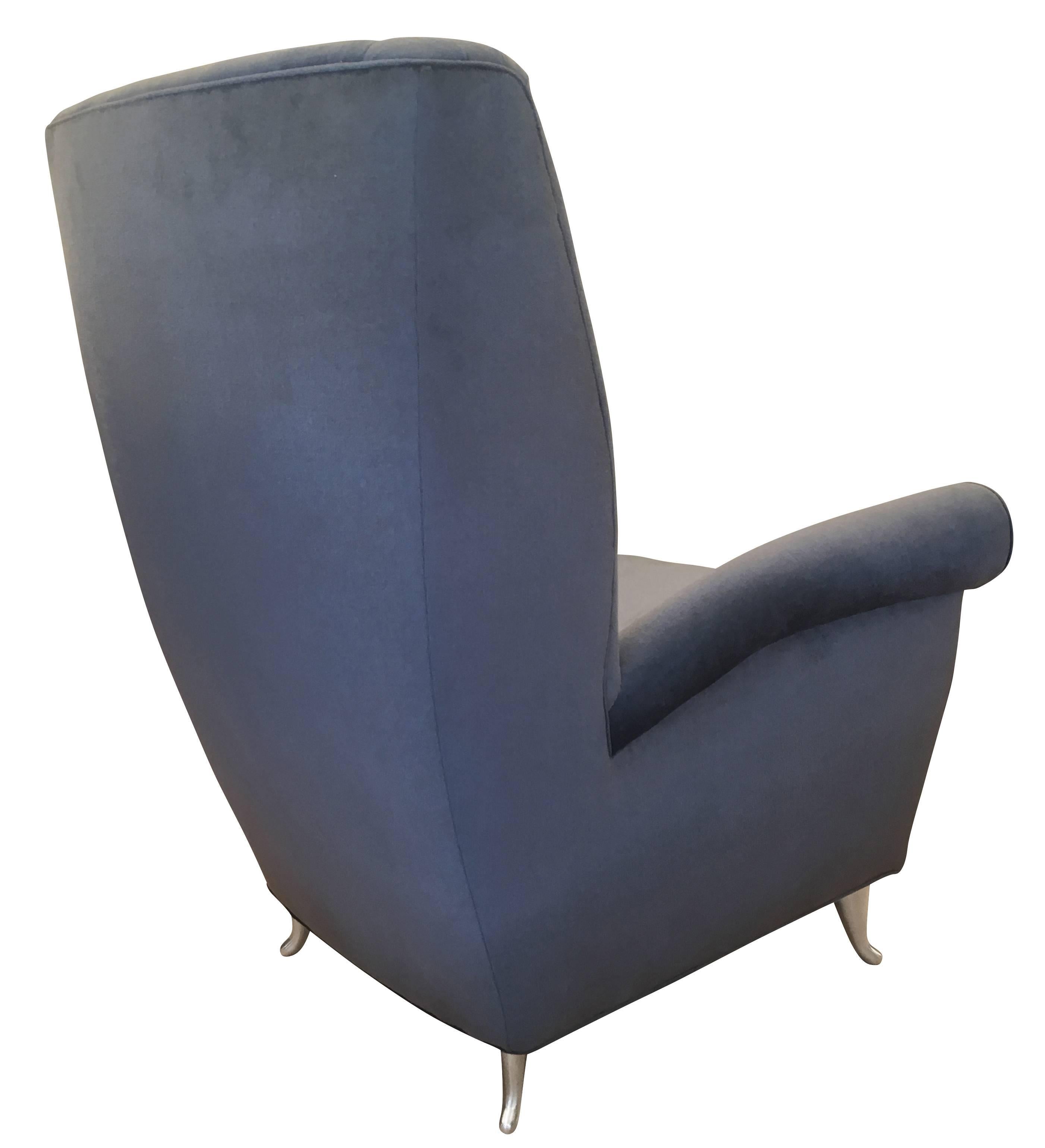 Sculptural ISA armchair at times attributed to Gio Ponti (Piasa Auction, March 2016, Lot 290). The feet are aluminum and it has been re-upholstered in a gray chenille fabric. 

Condition: Excellent vintage condition, minor wear consistent with age