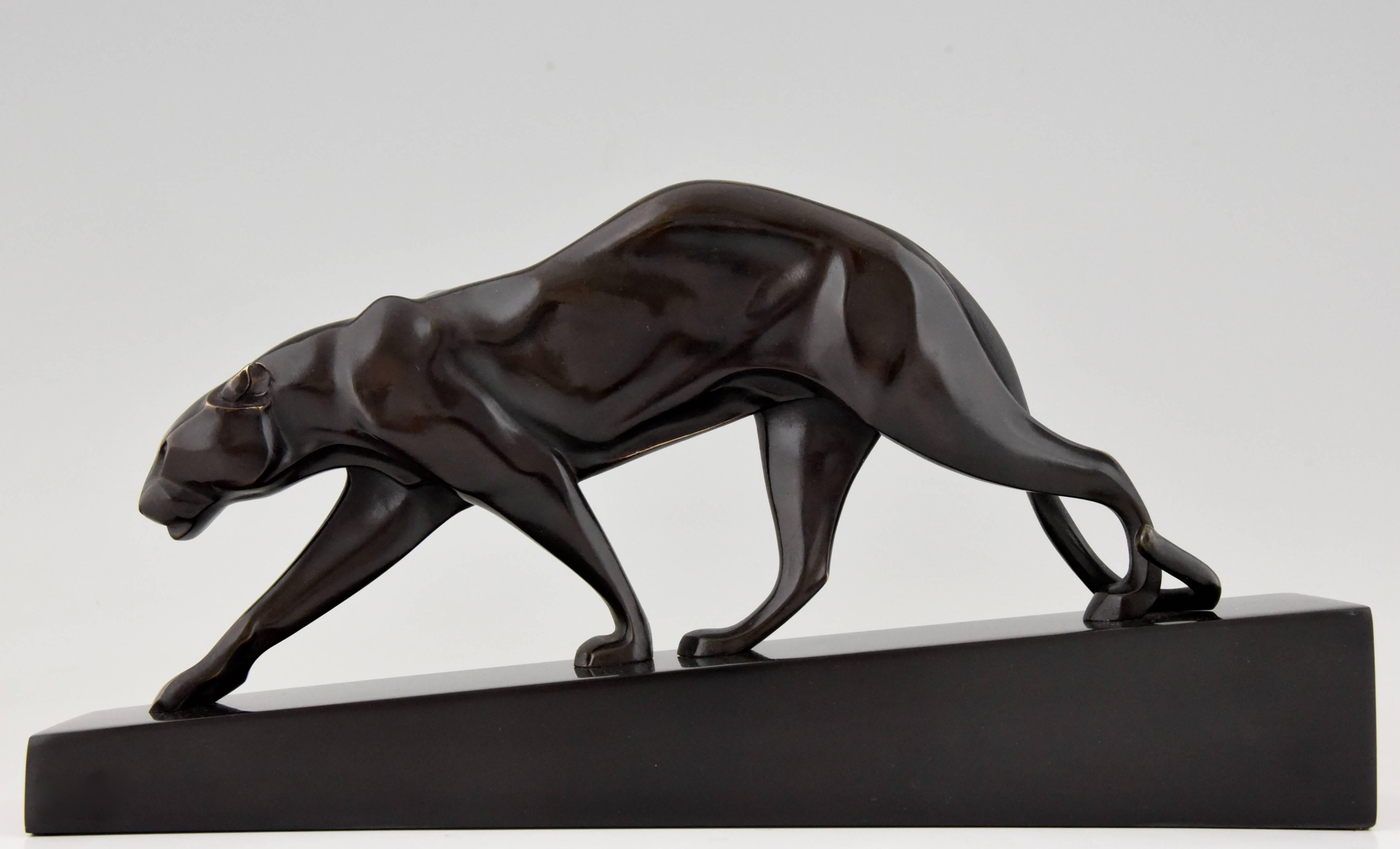 Stylish Art Deco bronze sculpture of a walking panther by Maurice Prost. Signed on the black marble base and with founders' signature.
Original and authentic sculpture of the Art Deco period. 

Artist/Maker:
Maurice Prost.
Signature/Marks:
M.