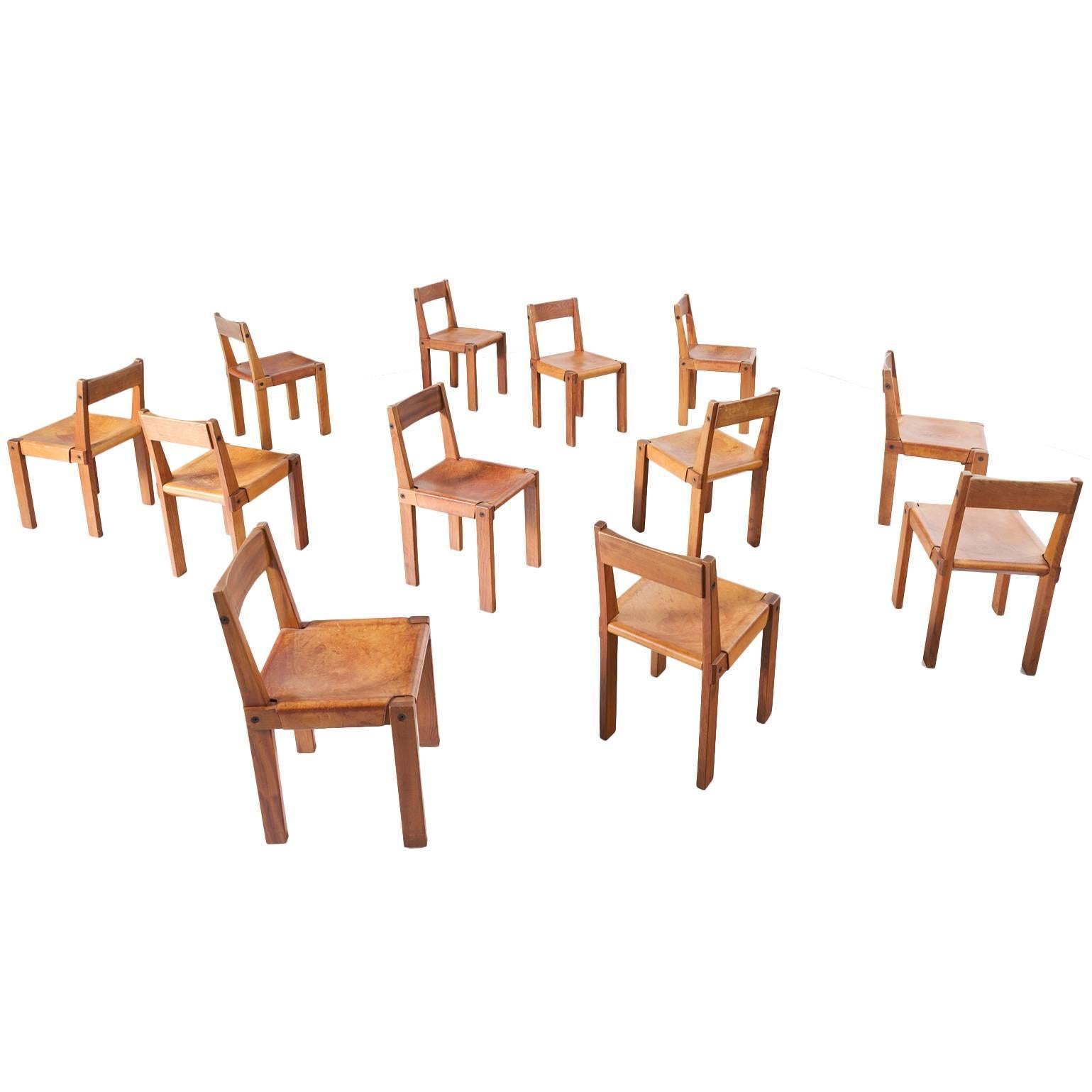 Pierre Chapo Set of 12 'S24' Dining Chairs in Elm and Patinated Cognac Leather