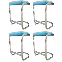 Four Cantilevered Chrome Stools by DIA 10