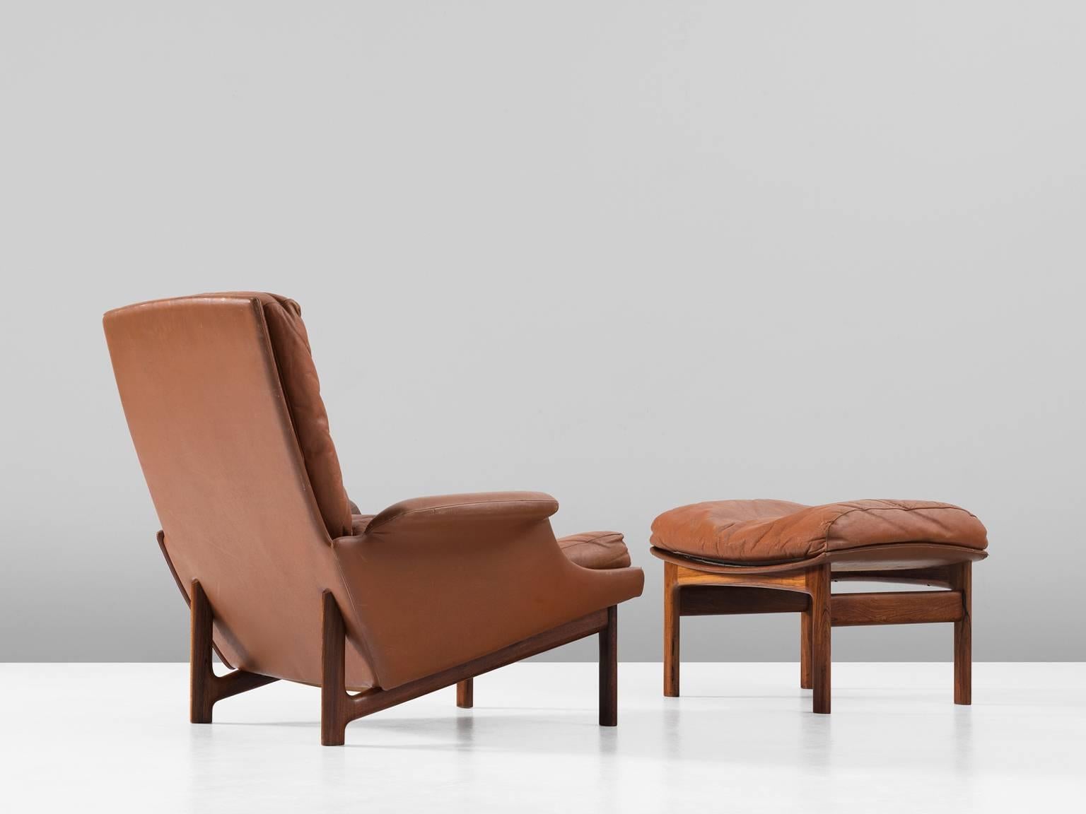 Danish Ib Kofod-Larsen Rare Lounge Chair and Ottoman in Cognac Leather