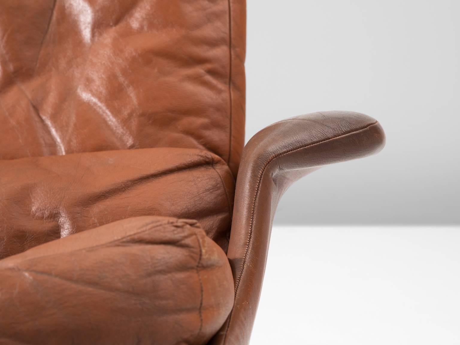 Mid-20th Century Ib Kofod-Larsen Rare Lounge Chair and Ottoman in Cognac Leather