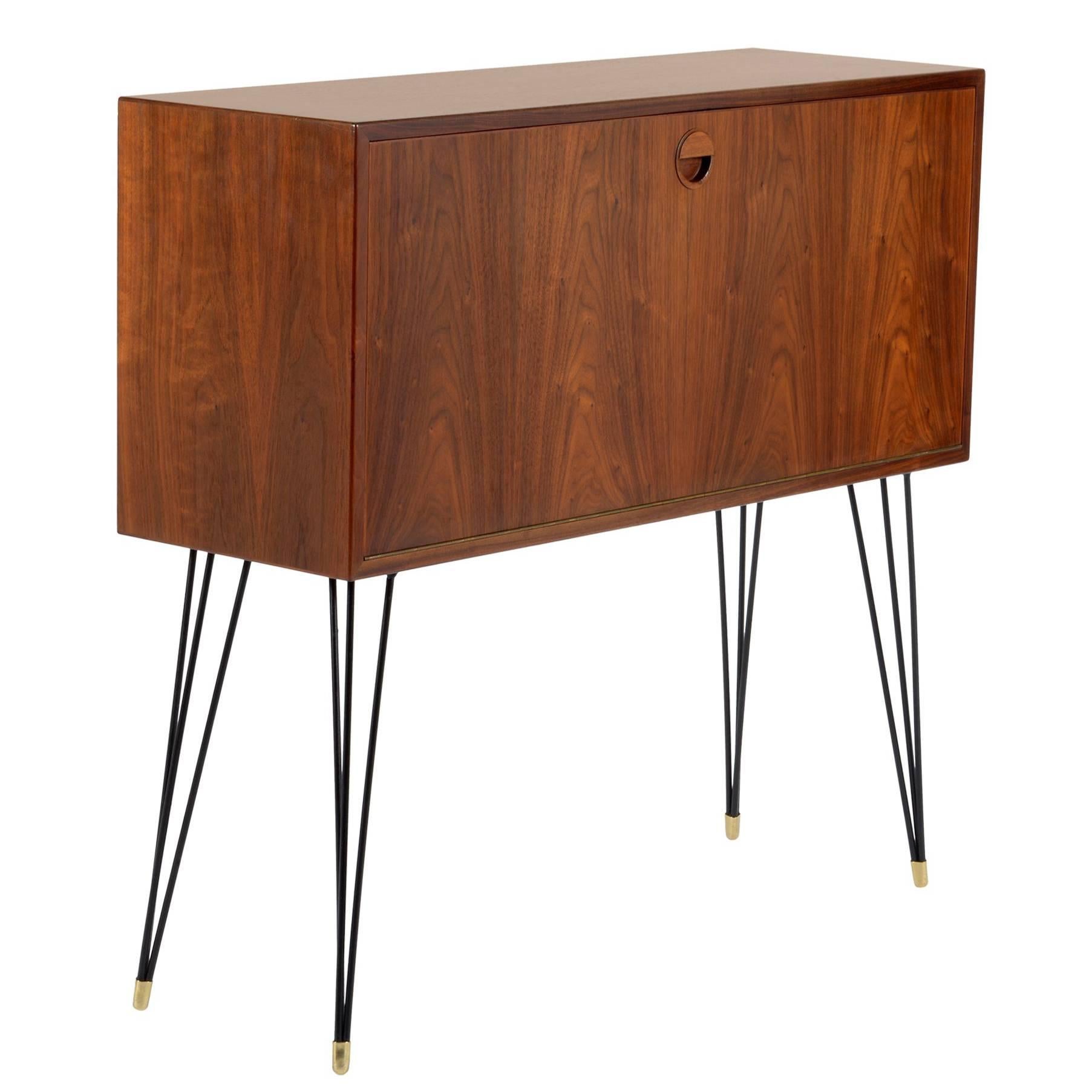 One  Slender Teak Wood Cabinet with Metal Legs, Signed For Sale