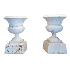Pair of 19th Century Cast Iron Urns on Pedestal
