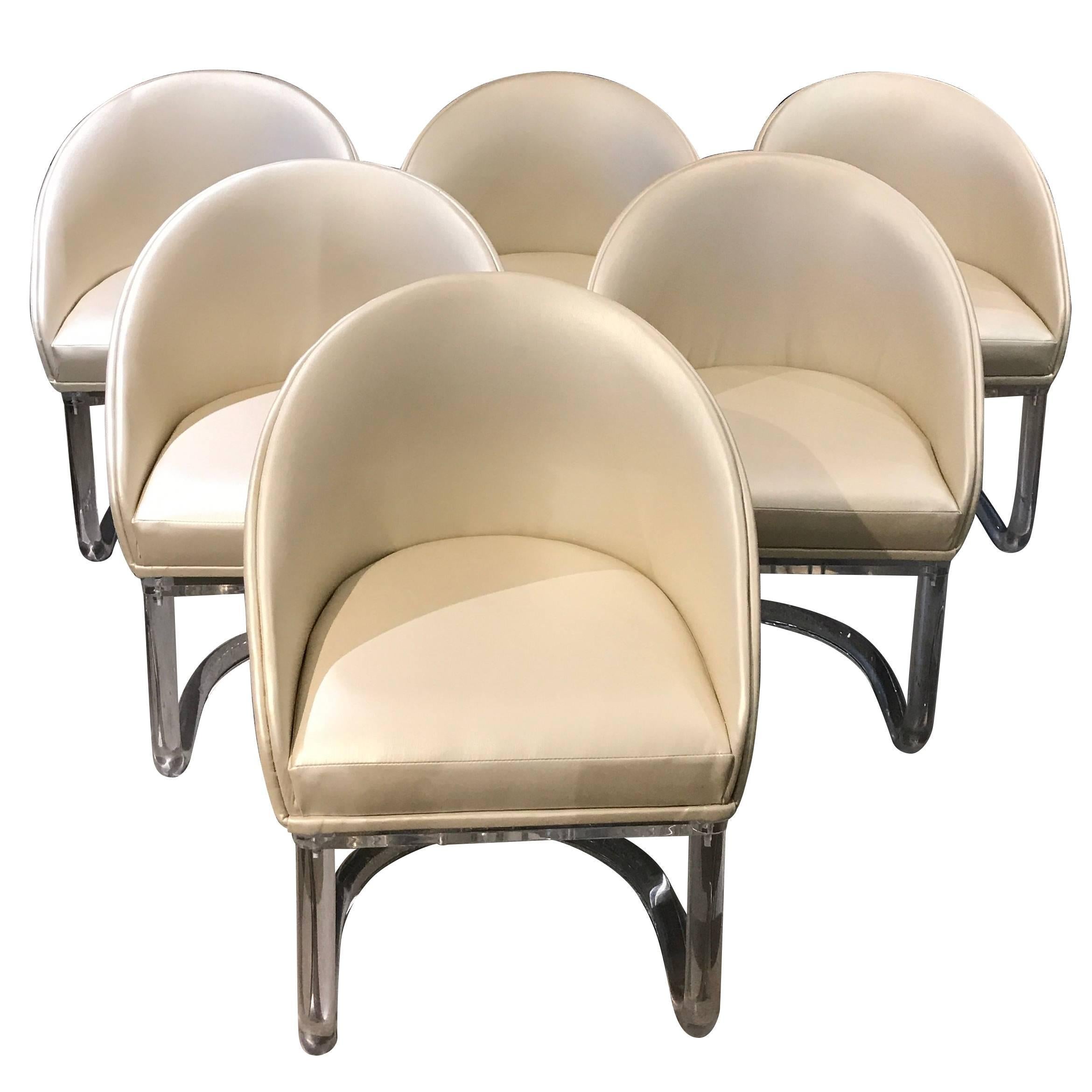 Set of six Lion in Frost Swivel Lucite Base Chairs