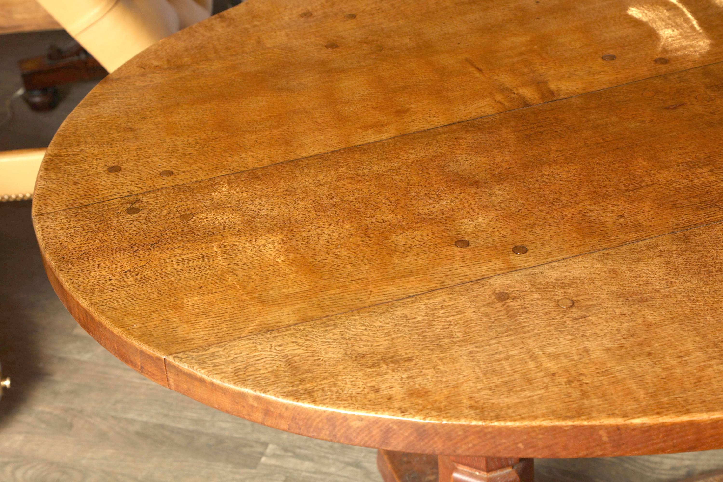 Handpicked by buyers at Ann-Morris Inc.

Unusual Oval shape “Mouseman” Table with great proportion between top and base.  This table is unusually strong due to thick oak stretcher and legs with the signature mouse carved into one leg. 