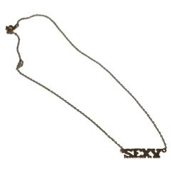 Chic 'Sexy' Nameplate Necklace in 14-karat Gold, 1970s 11