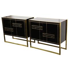 Used One of a Kind Signed Pair of Black Glass and Brass Cabinets